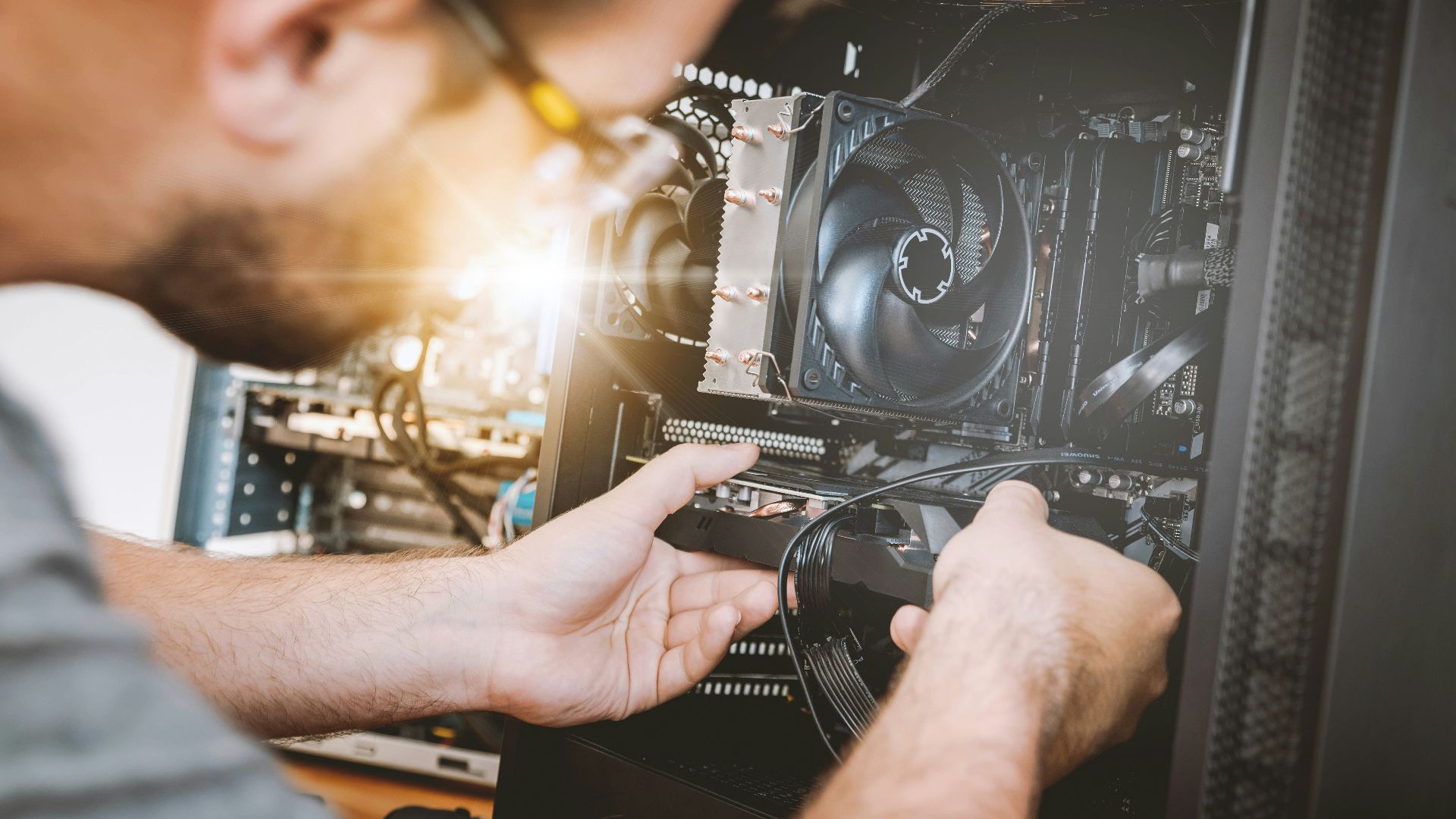 person holding black and silver dj controller