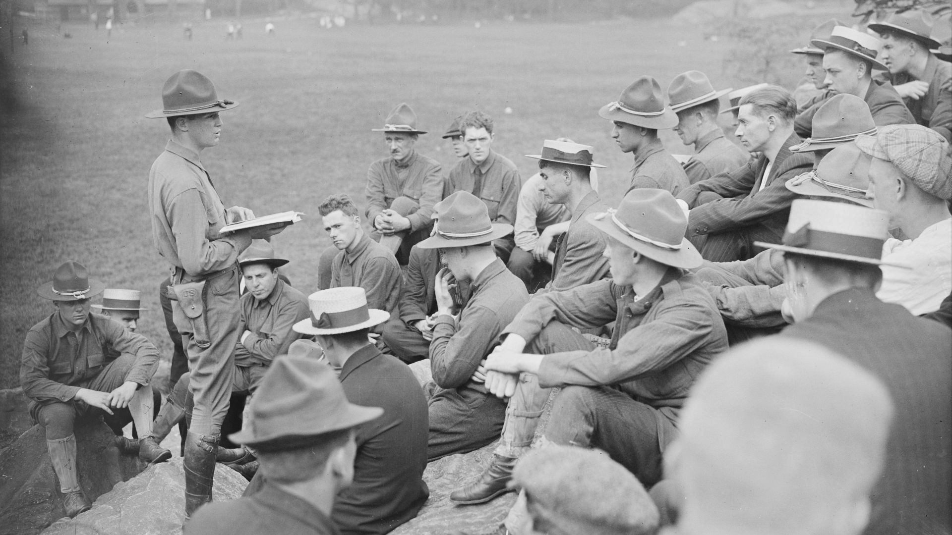 Officer reading war laws to a regiment of American soldiers during World War I.