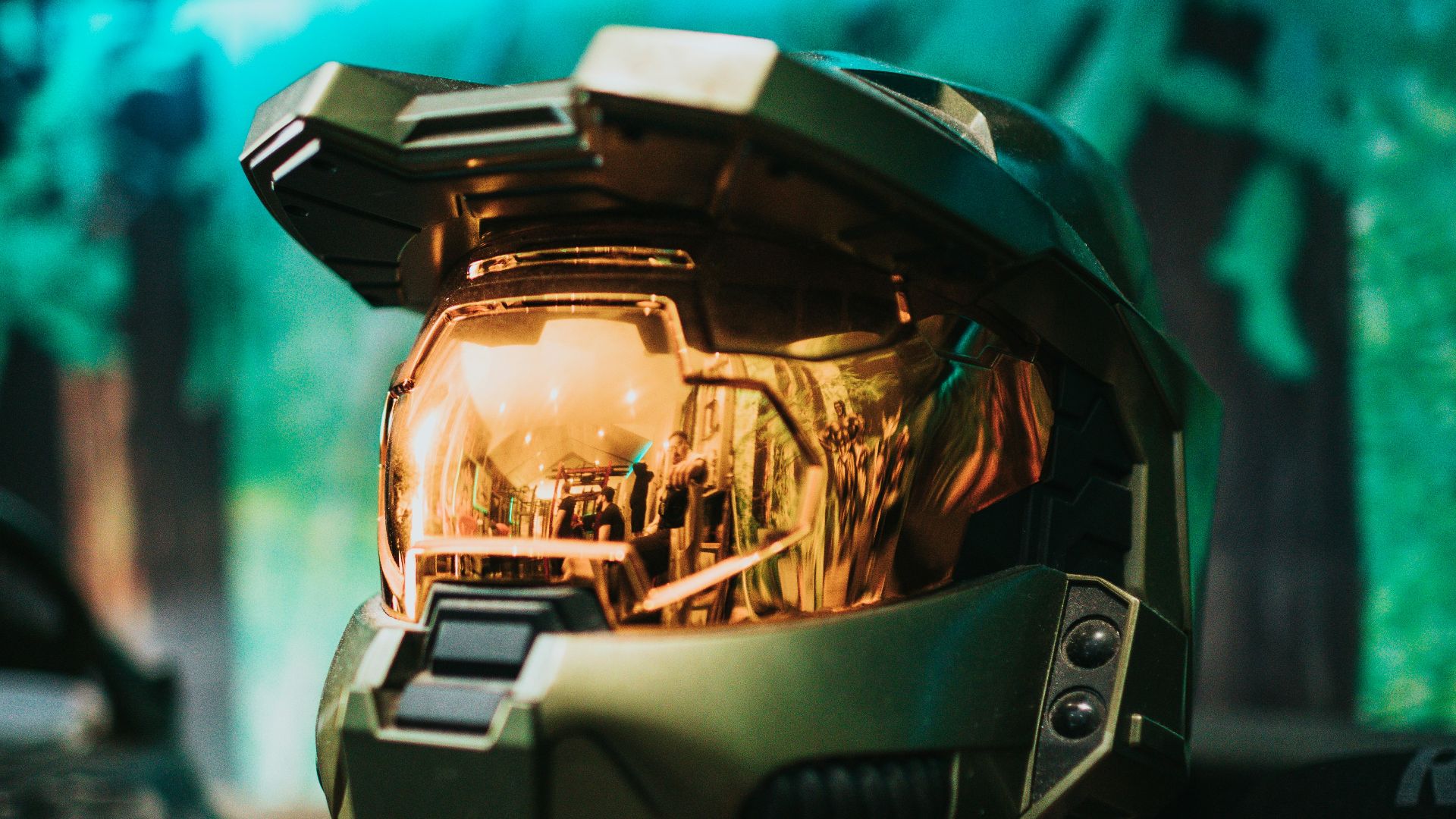 black and gray helmet on black and white textile