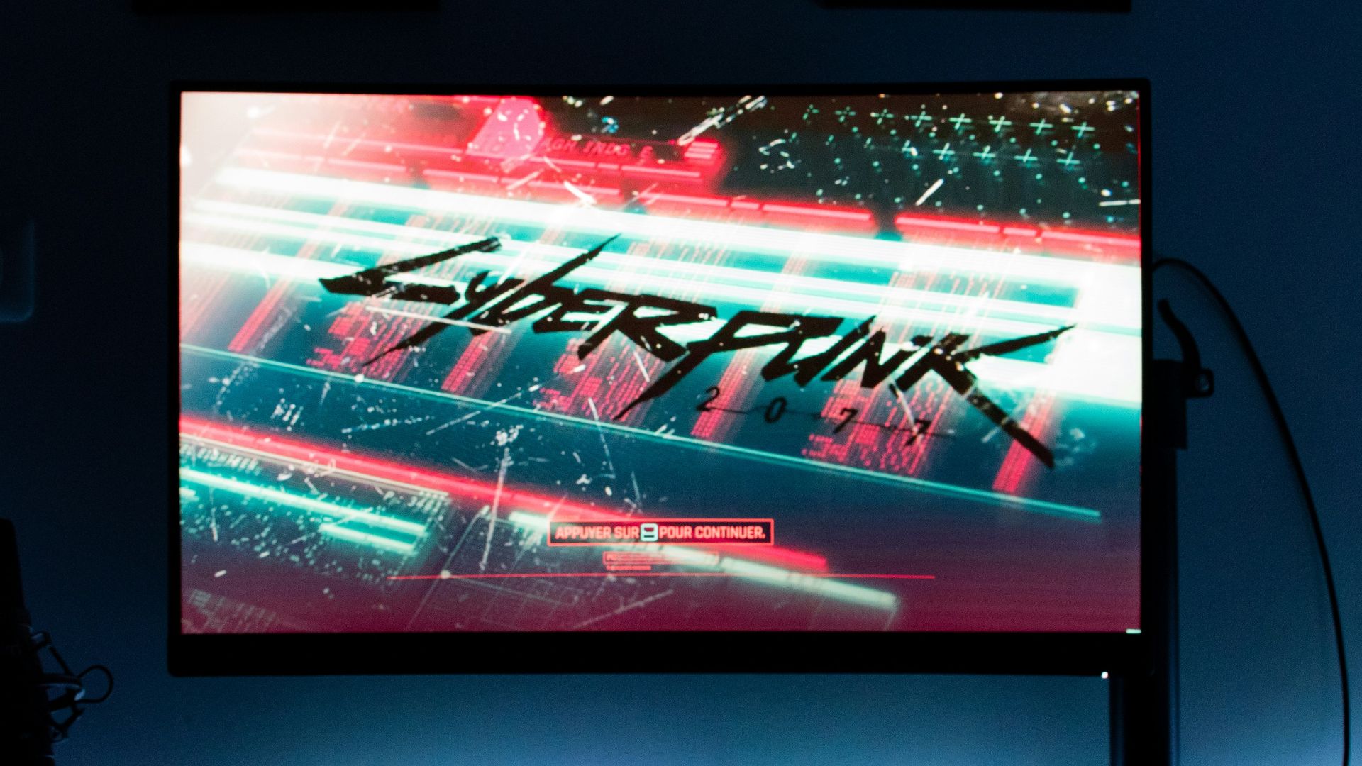 a computer monitor sitting on top of a desk