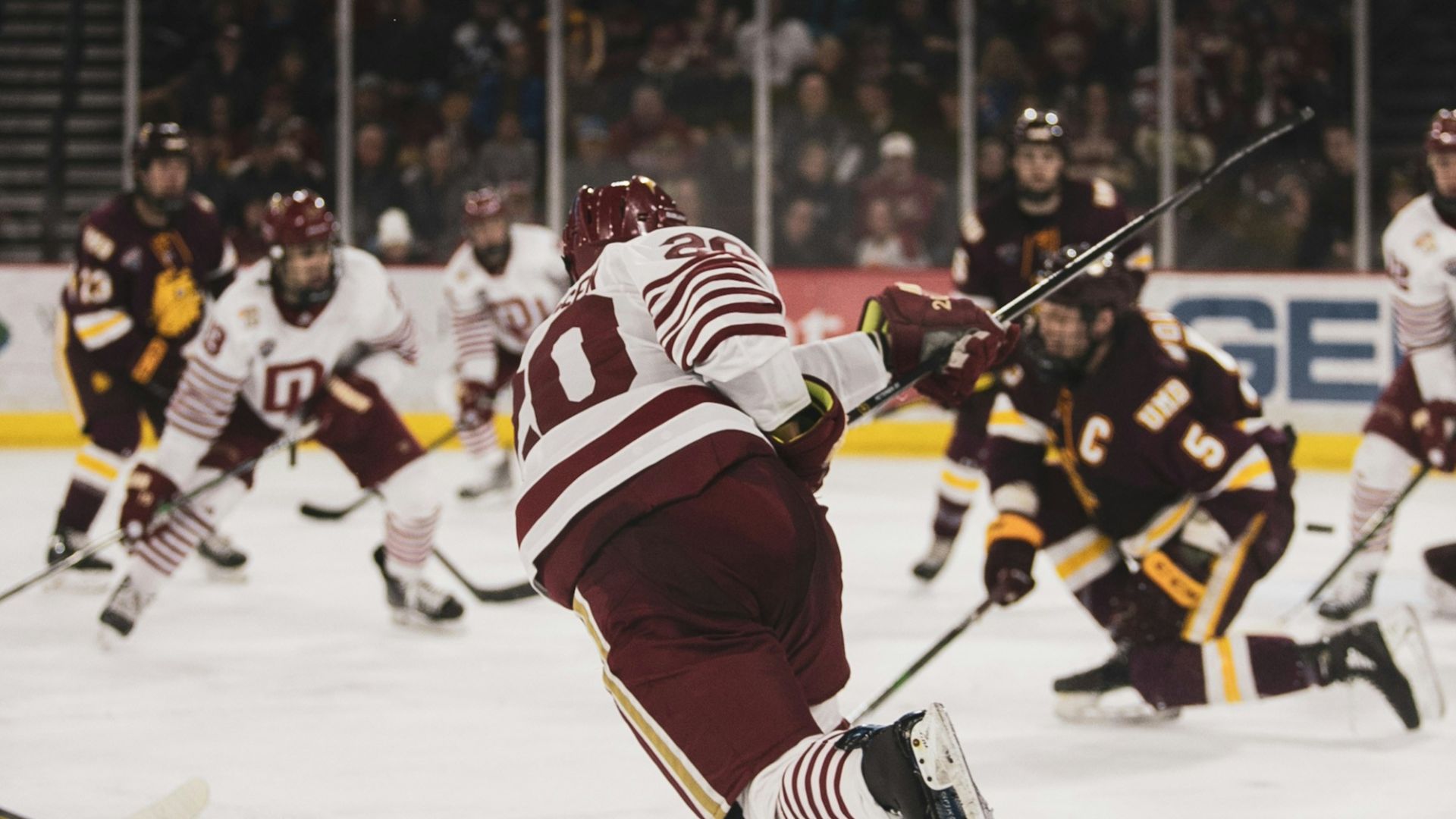 ice hockey players on ice hockey stadium