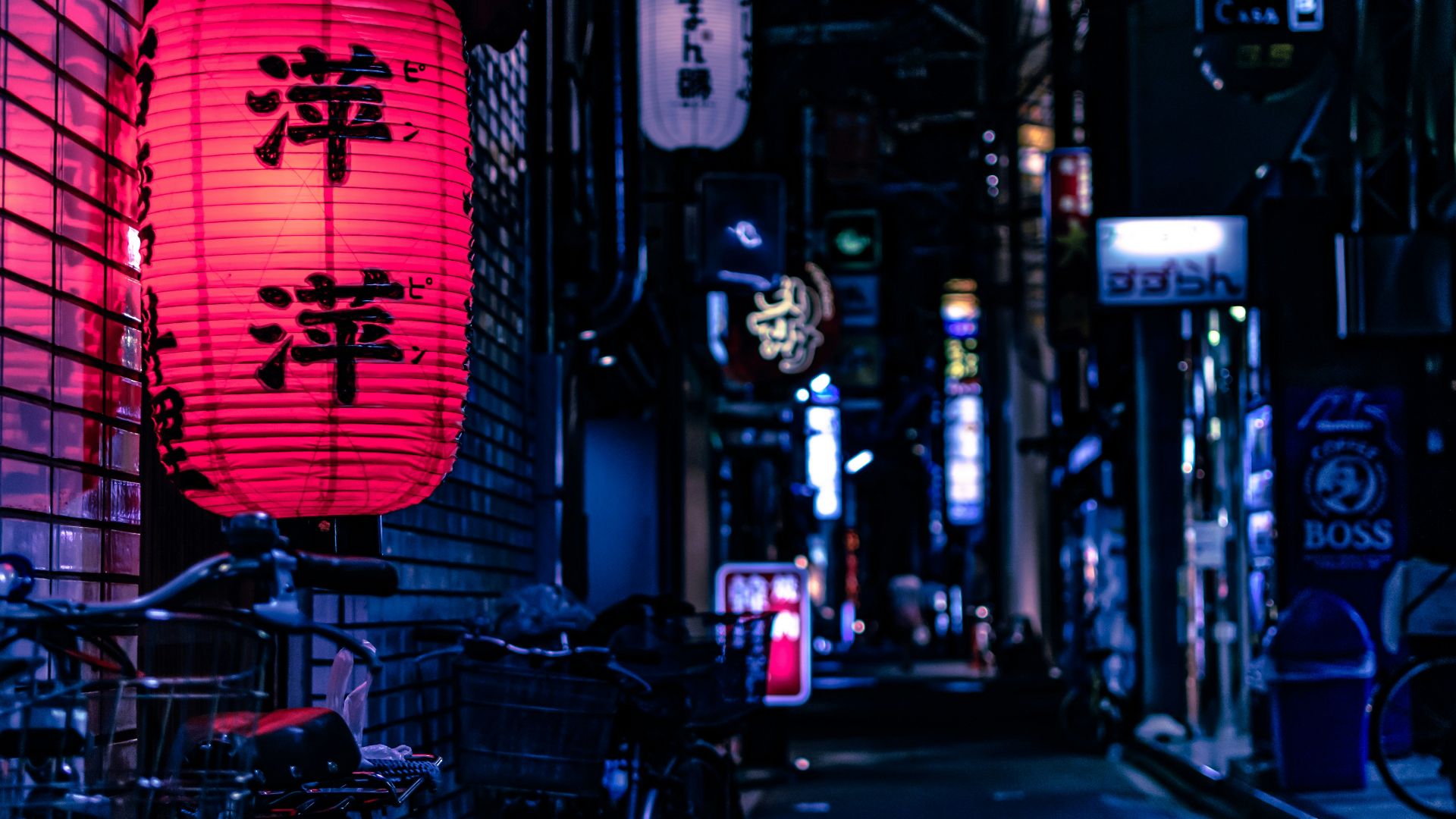Japanese lantern over city bike at nighttime