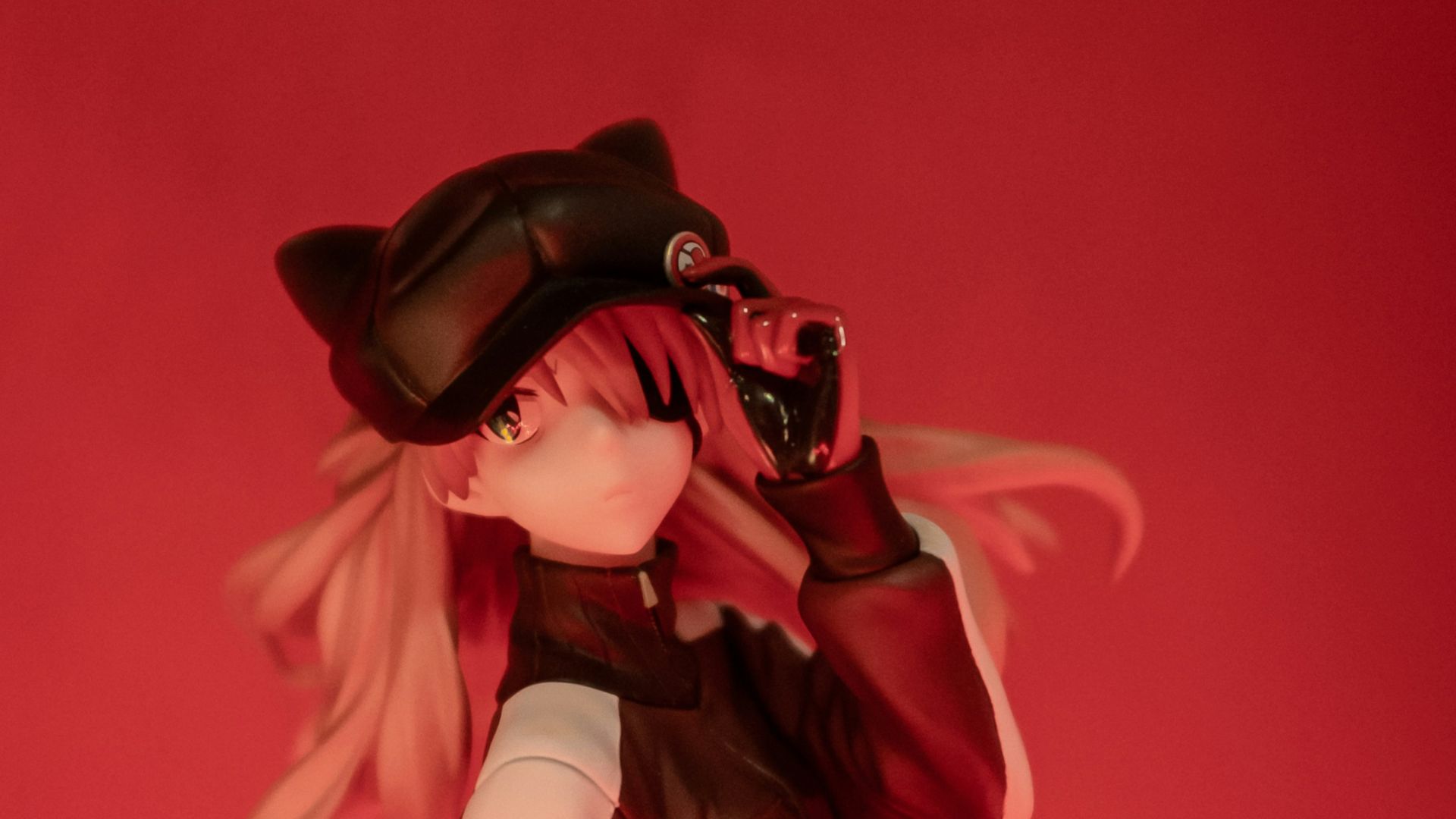 pink-haired female anime character action figure