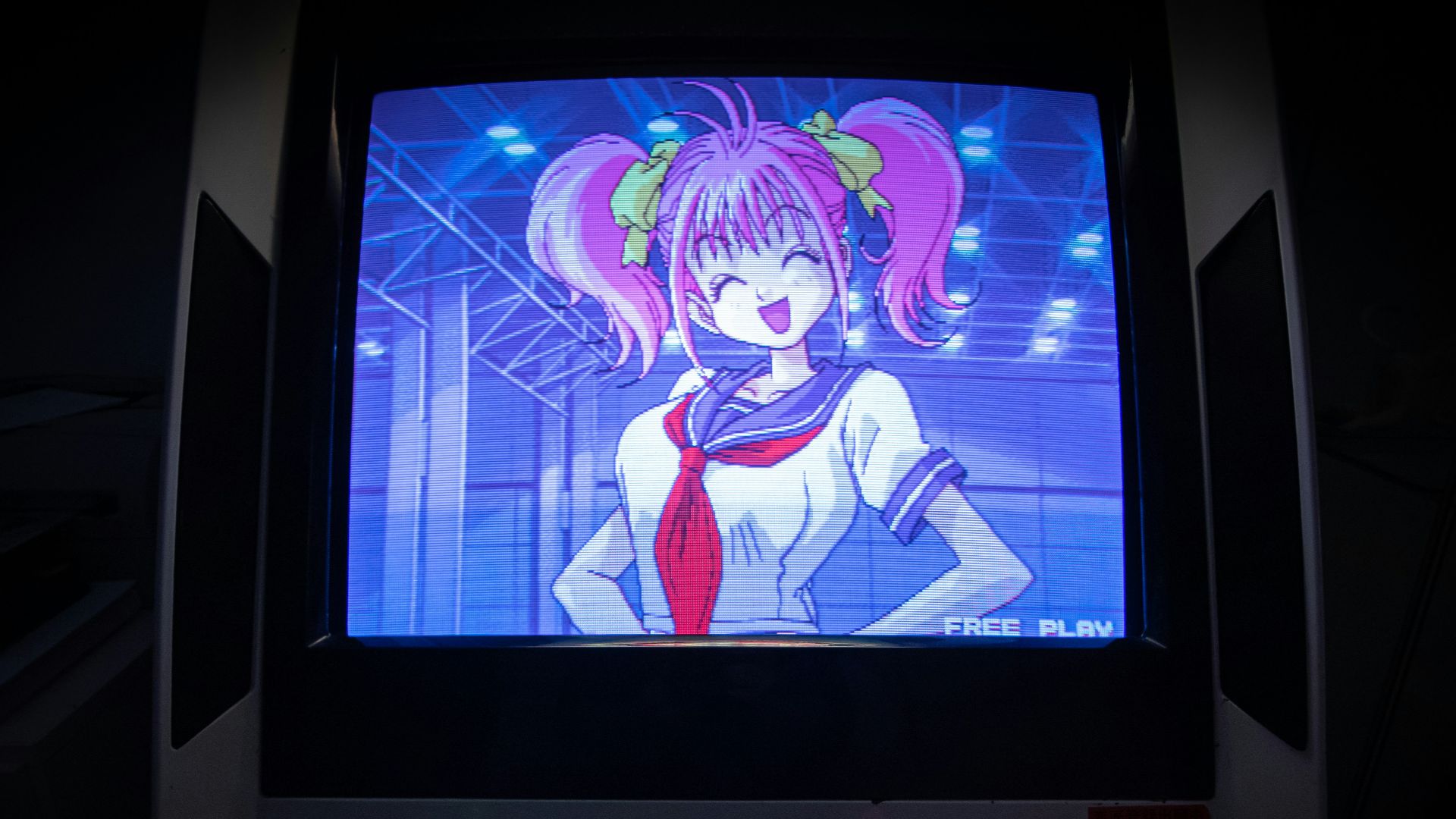 black flat screen tv turned on showing woman in blue dress