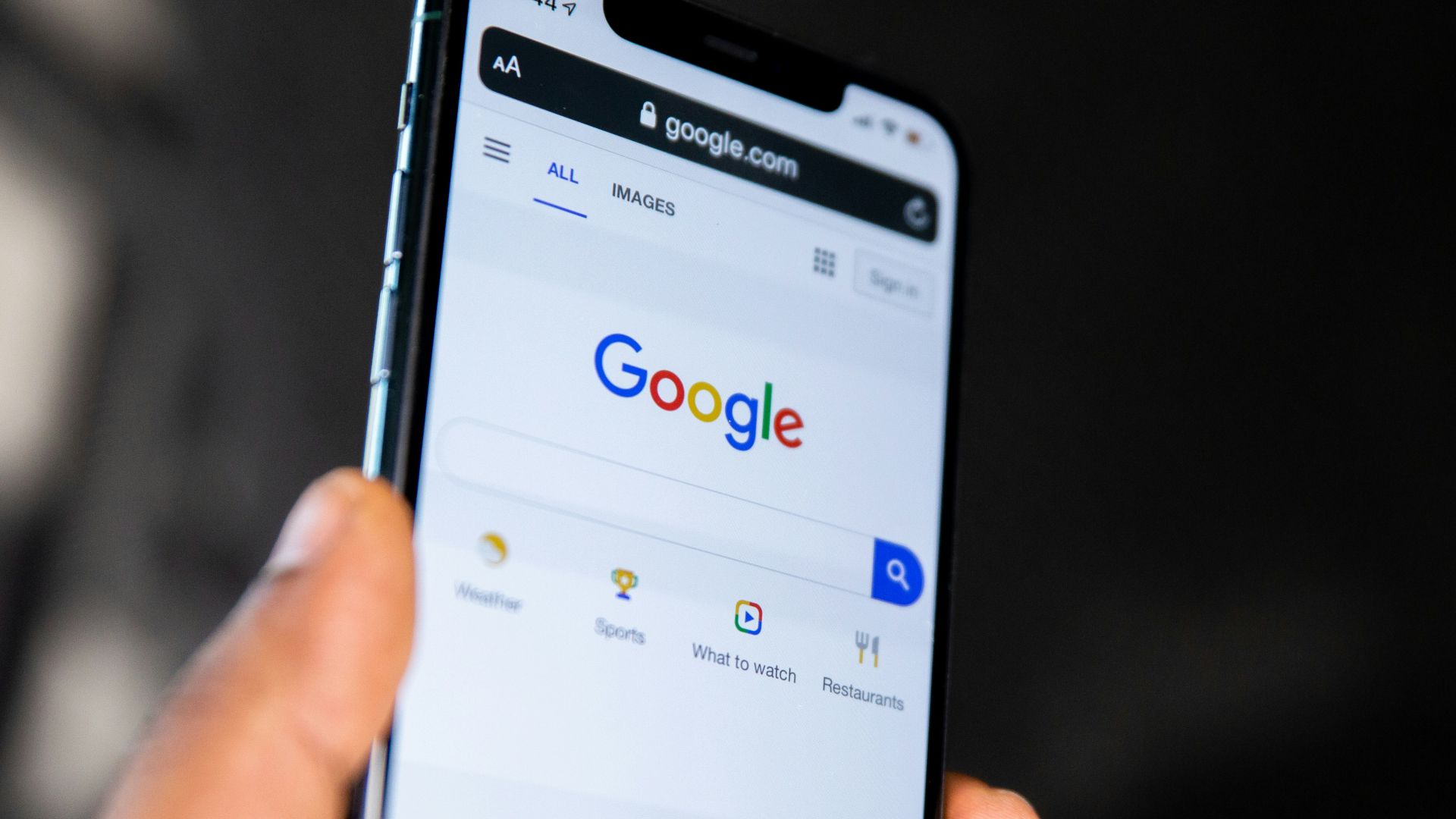 person holding black android smartphone