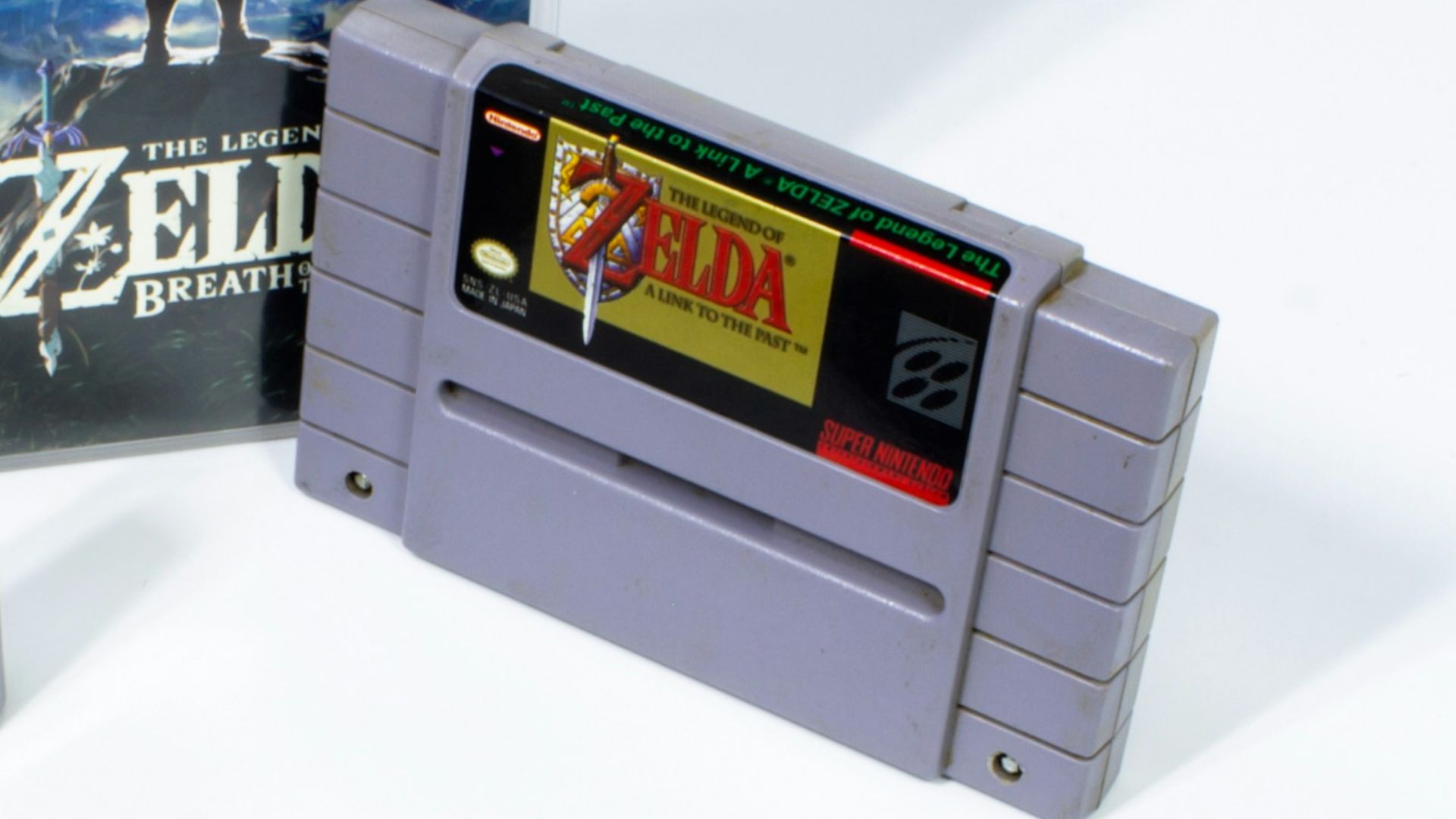 a nintendo game system with several games on it