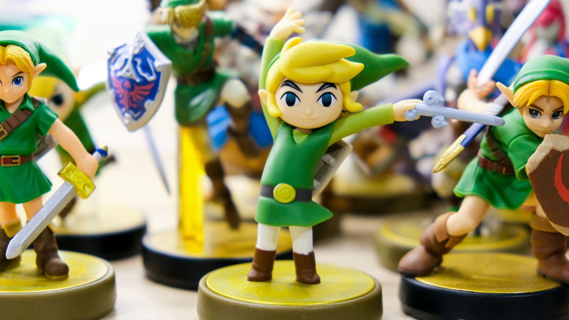 selective focus photography of Link vinyl figures