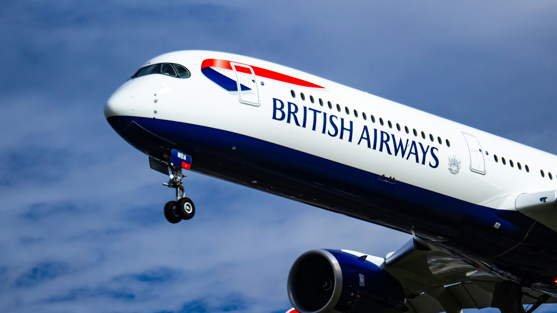 white and red UNK airplane under blue sky during daytime