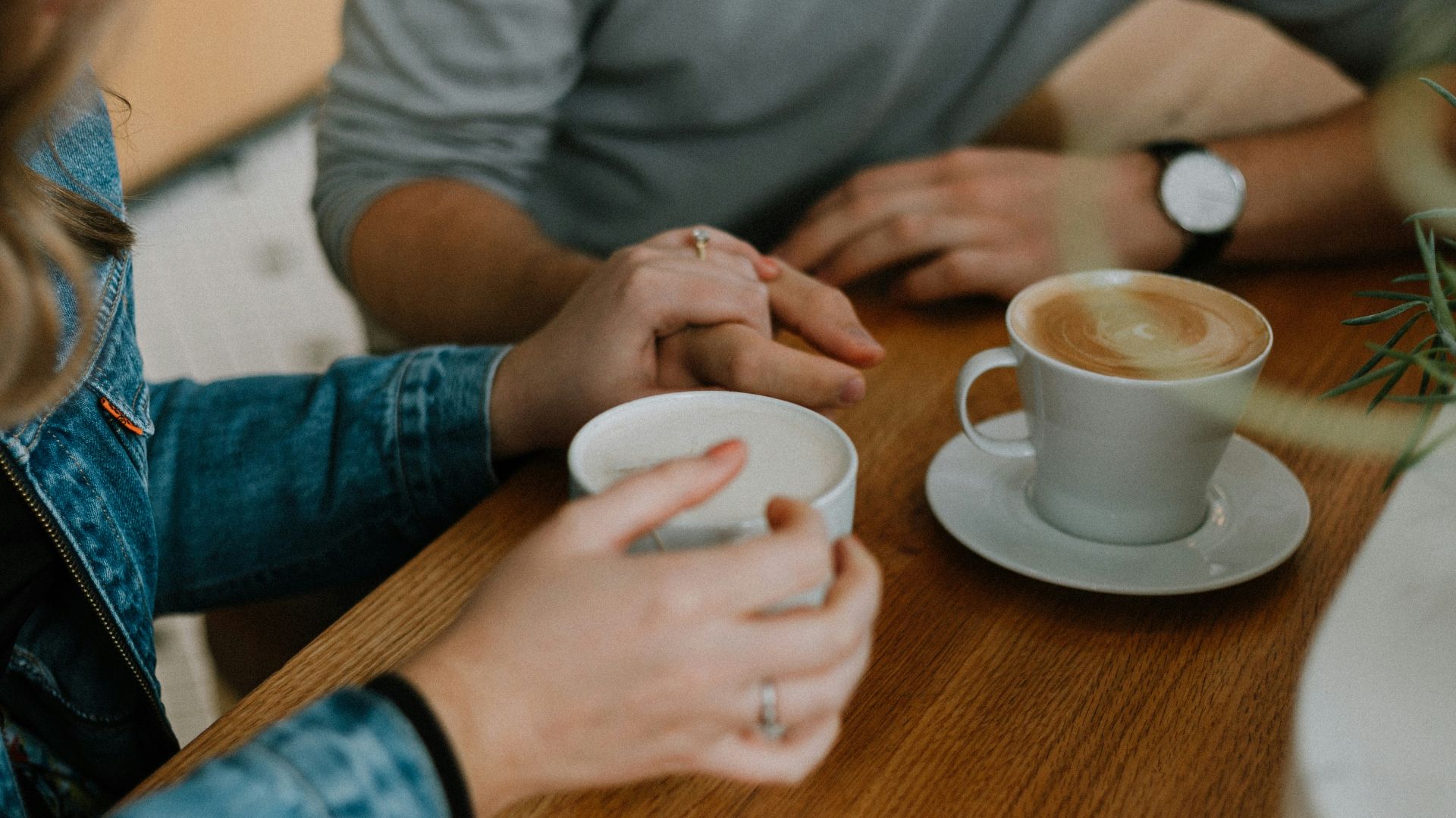 two mugs with coffee on table
