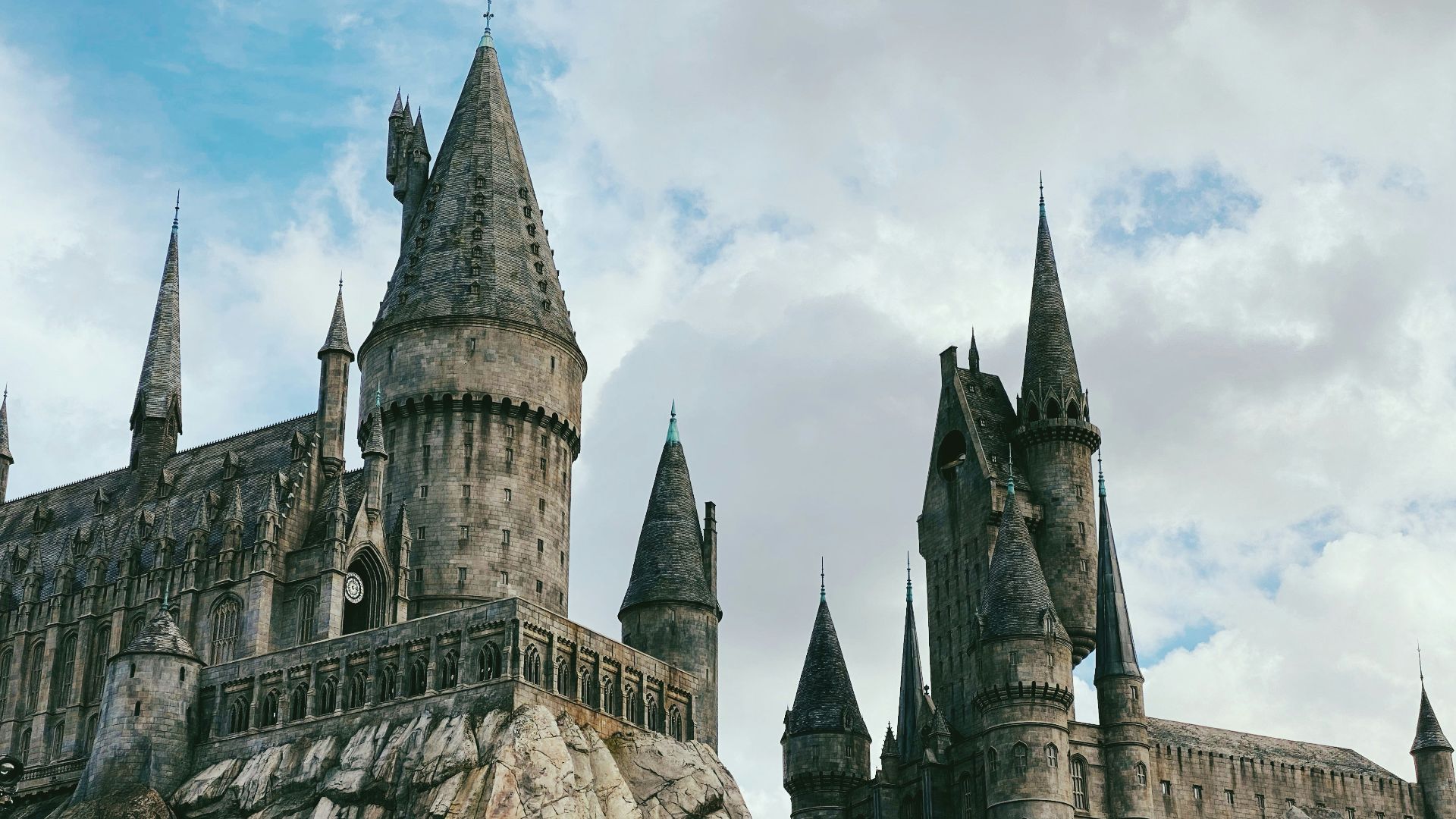 grey concrete castle under blue sky during daytime