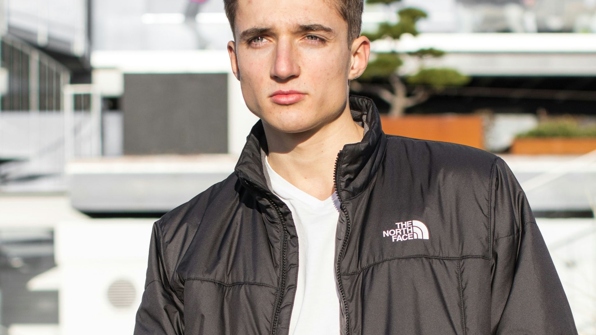 man wearing black The North Face bubble jacket