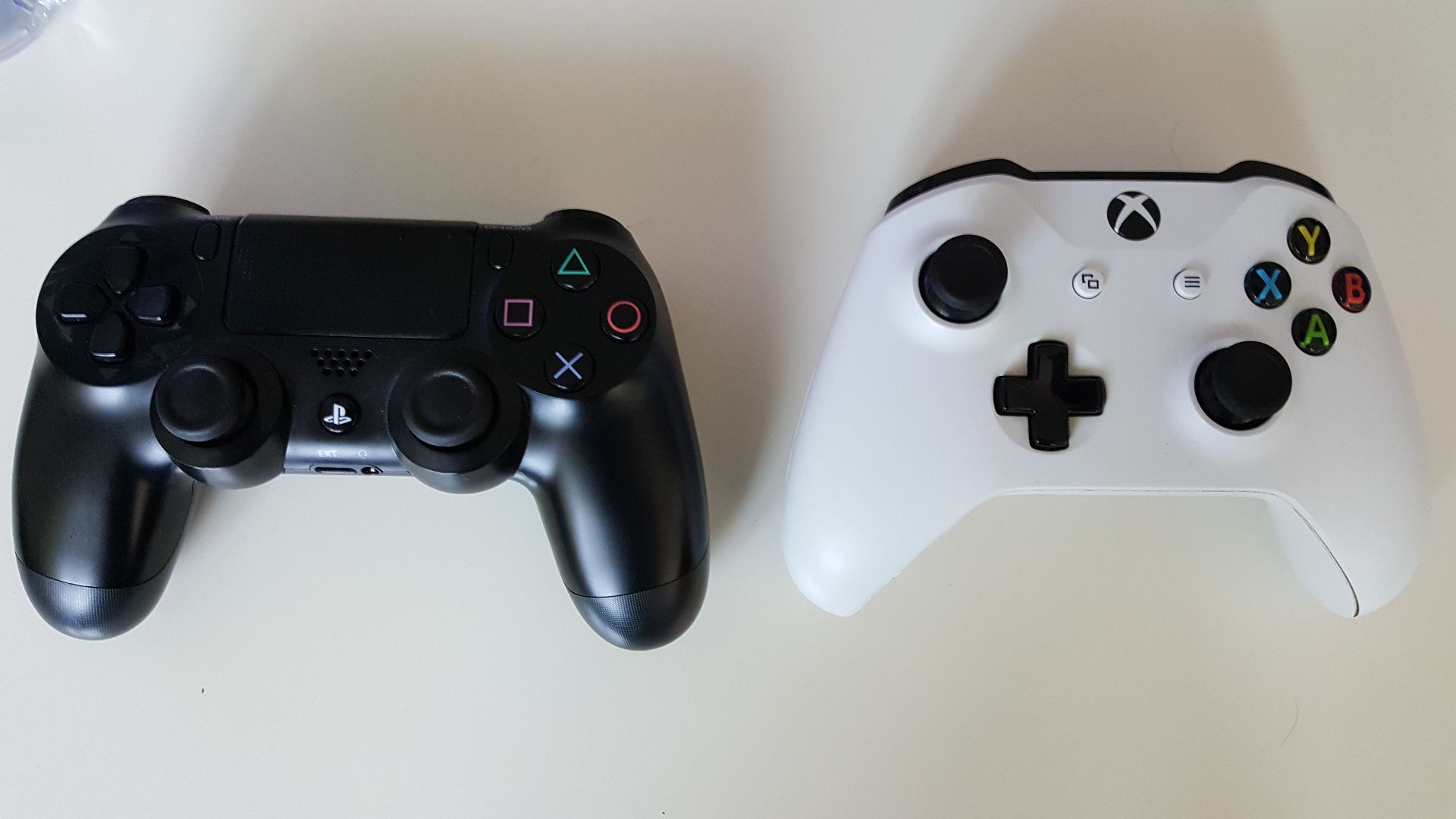 File:PS4 and Xbox One controller.jpg