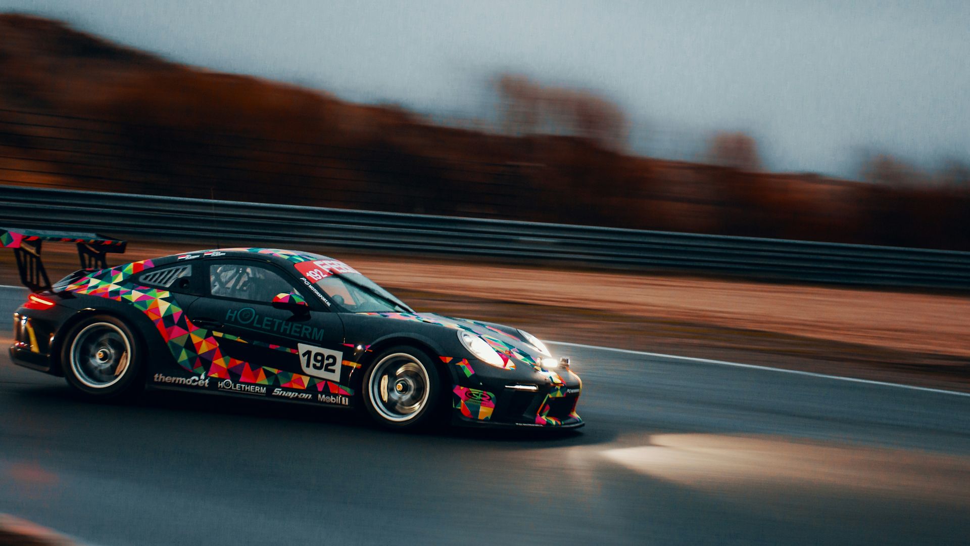 time lapse photography of car on road
