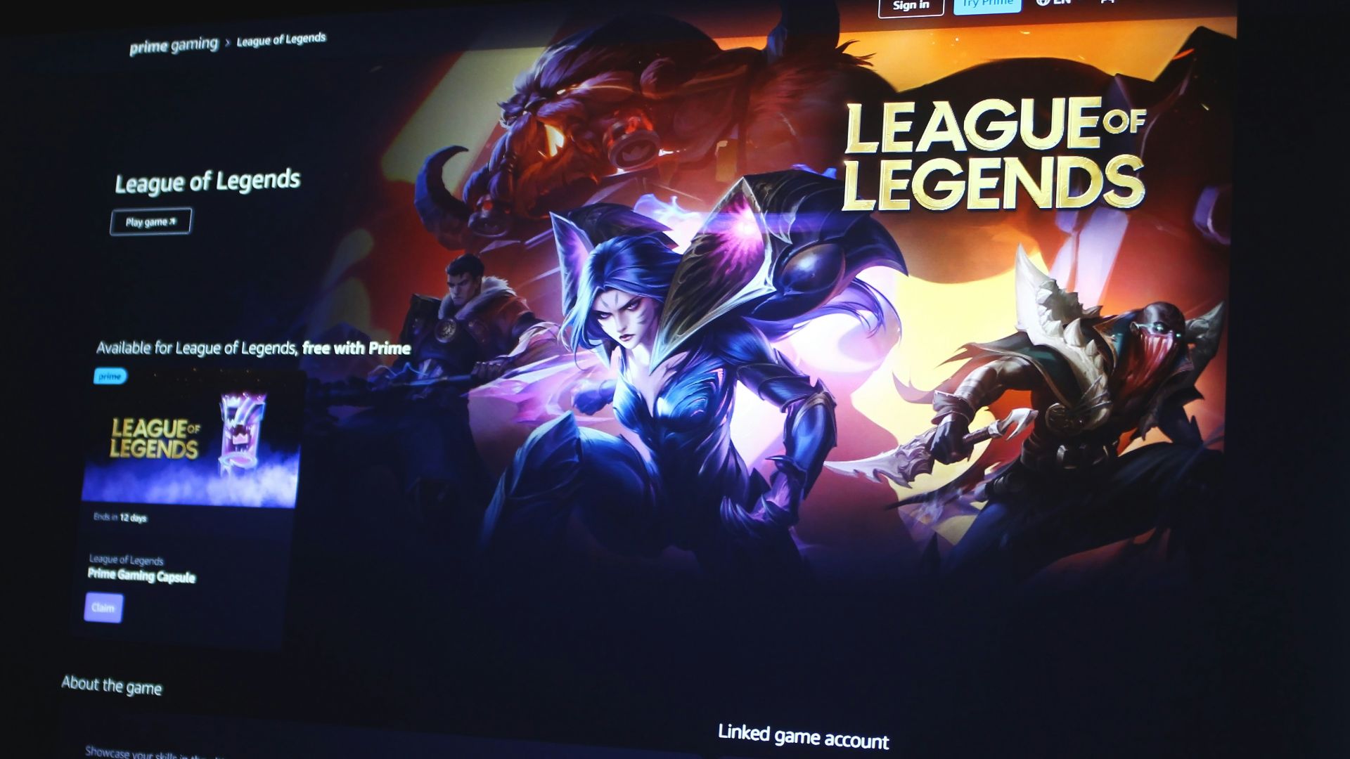 a computer screen with a league of legend logo on it