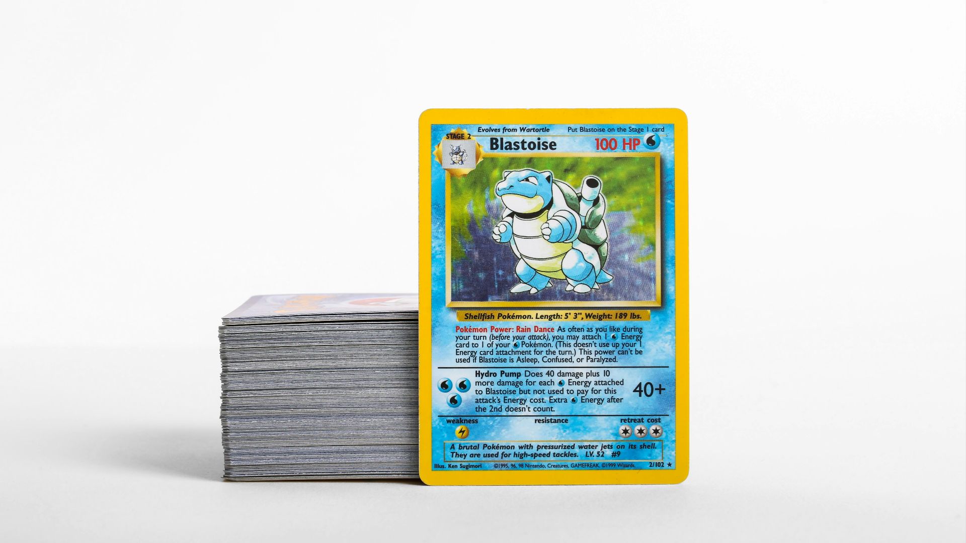 a stack of pokemon cards sitting on top of each other
