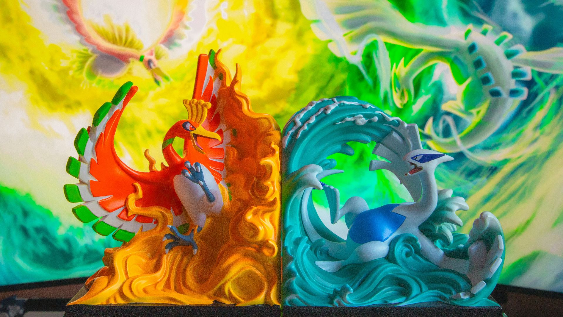 A couple of figurines sitting on top of a table