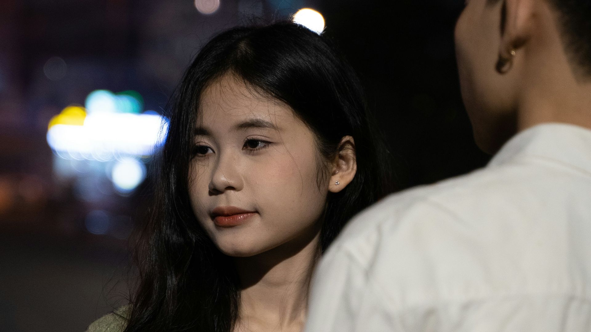 a man and a woman standing next to each other