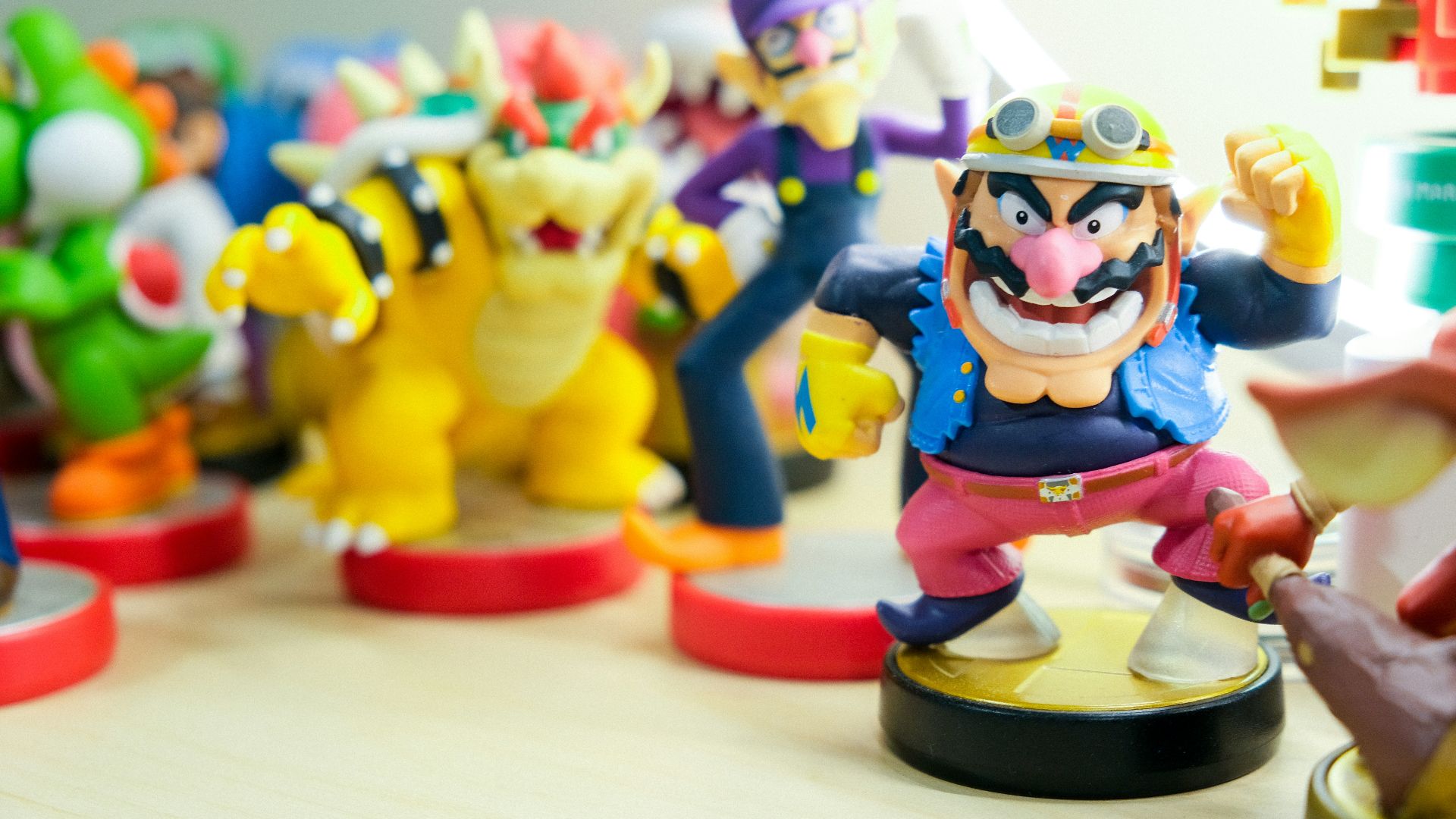 Super Mario vinyl figures on table