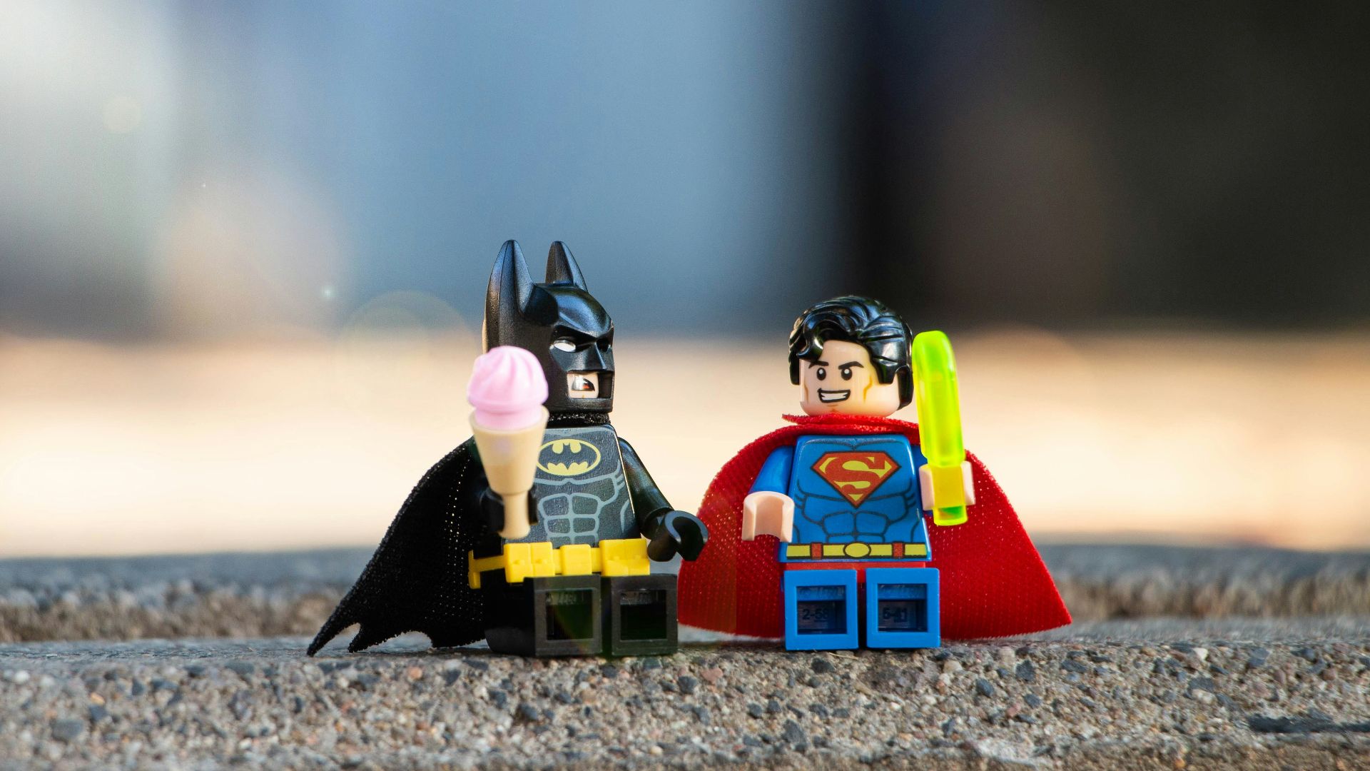 lego mini figure on brown sand