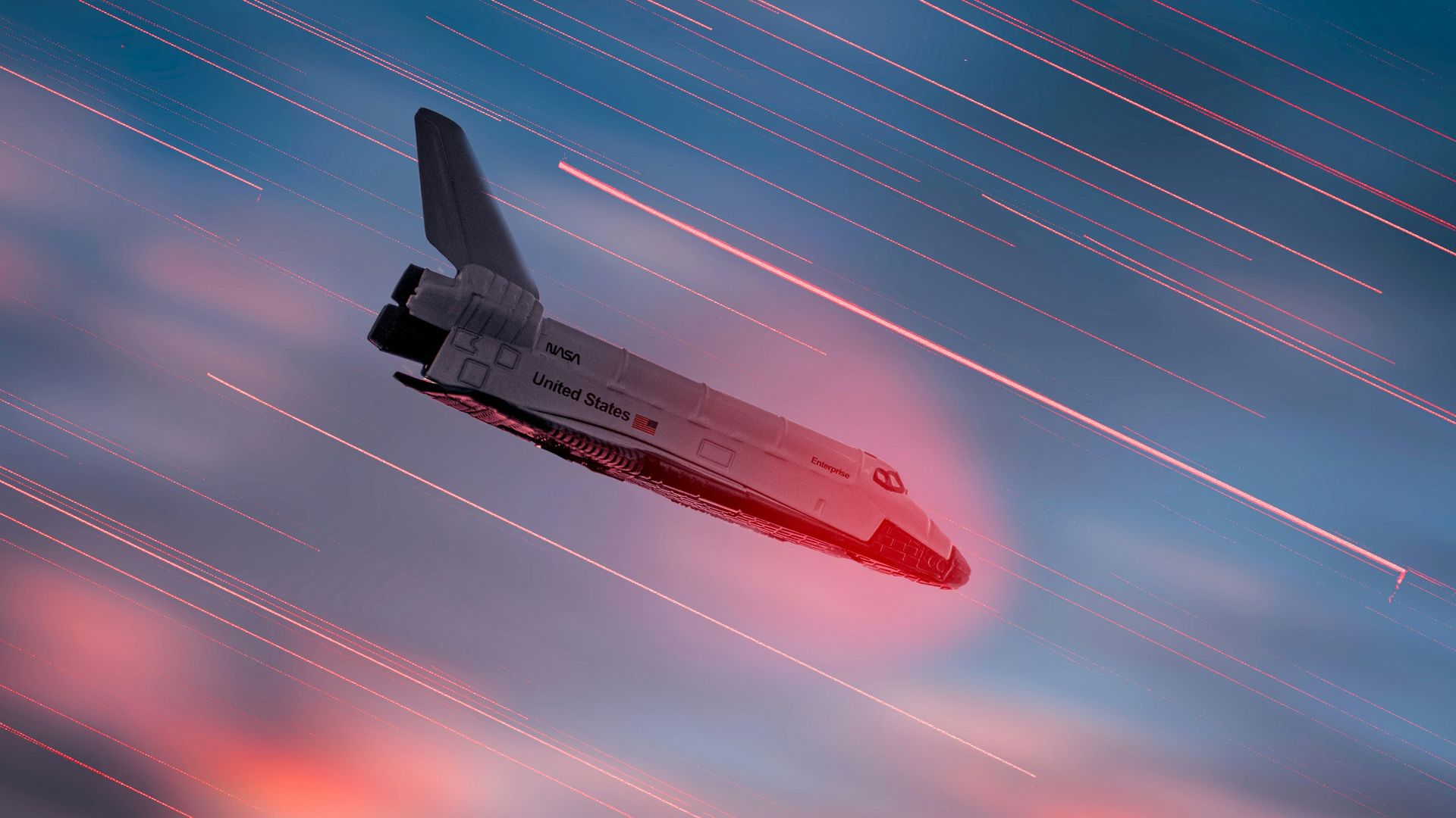 an airplane is flying in the sky at sunset