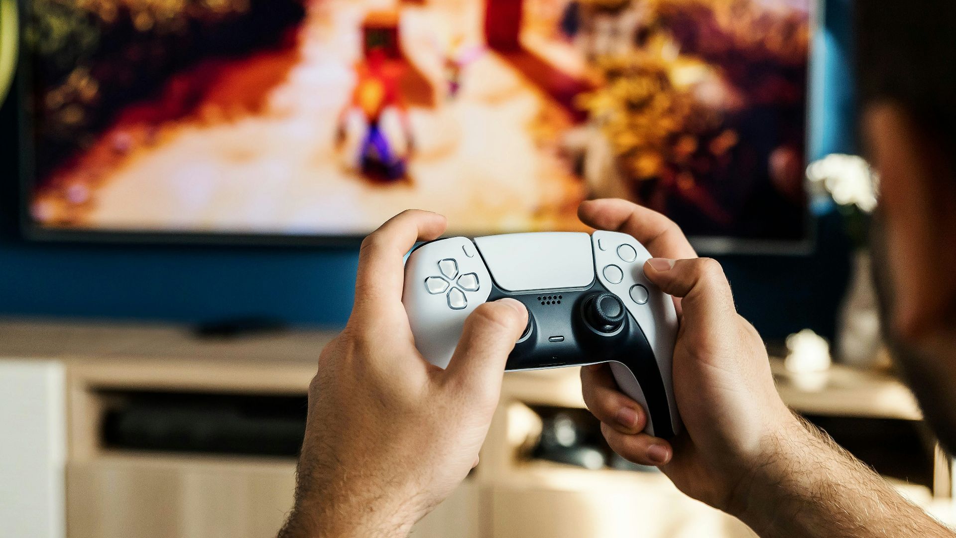 a man playing a video game on the nintendo wii