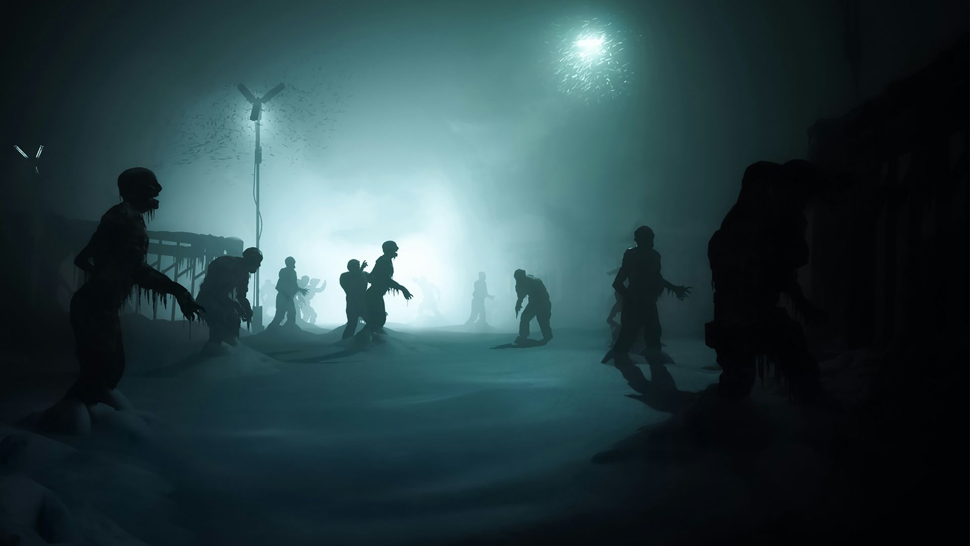 a group of people standing in the snow at night