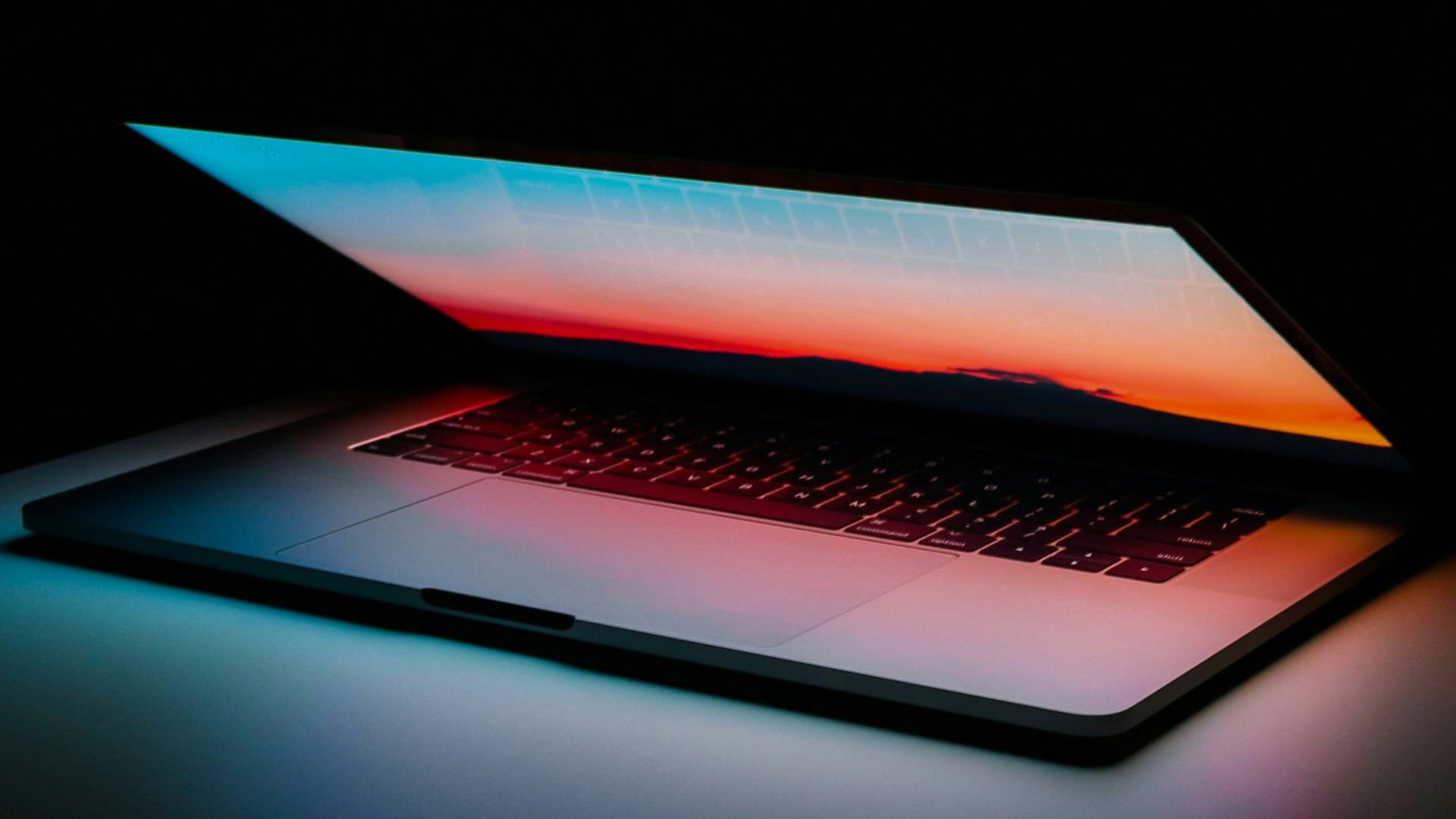 gray and black laptop computer on surface