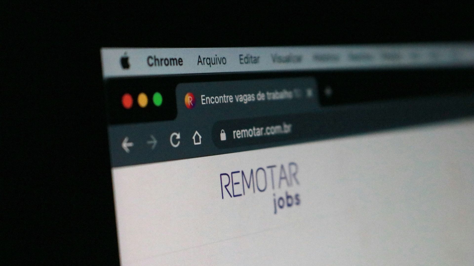 a computer screen with a remote control on it
