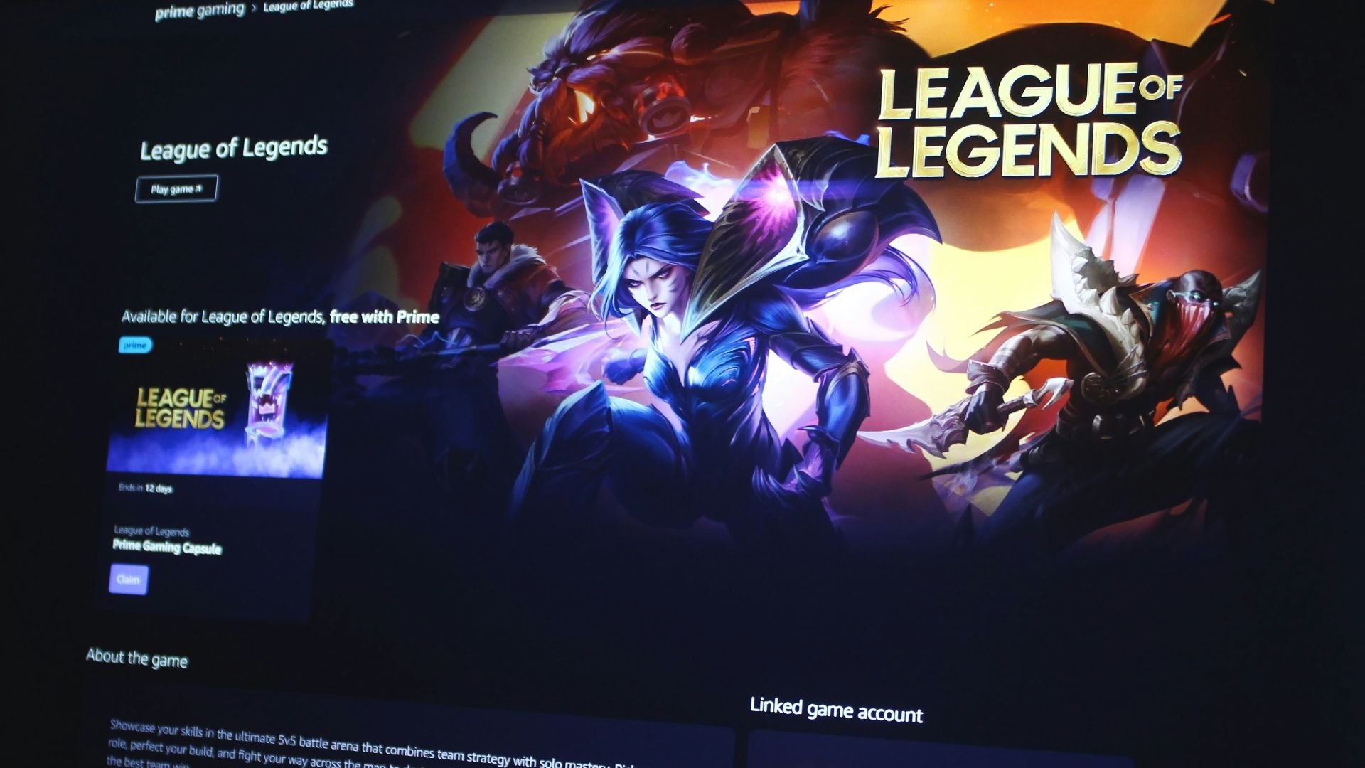 a computer screen with a league of legend logo on it