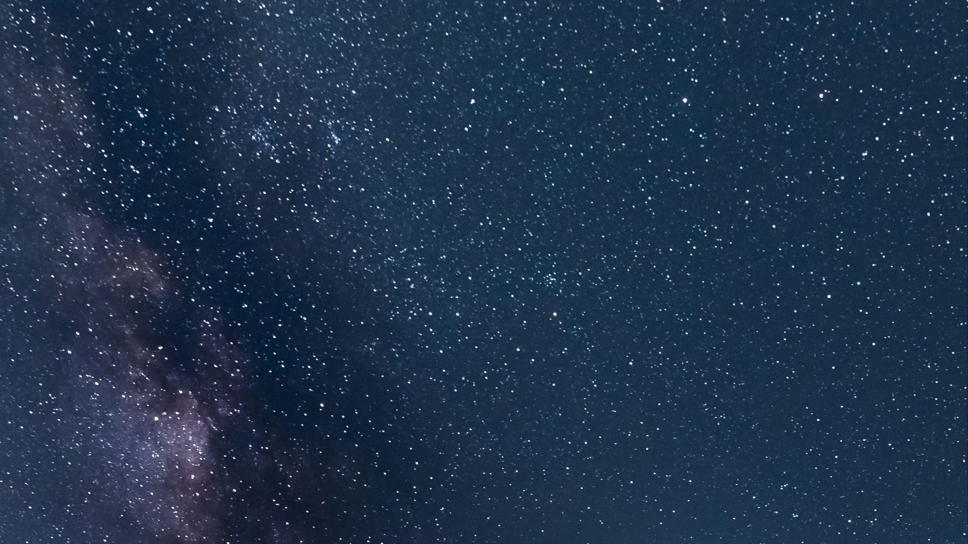 white and black light house under starry night