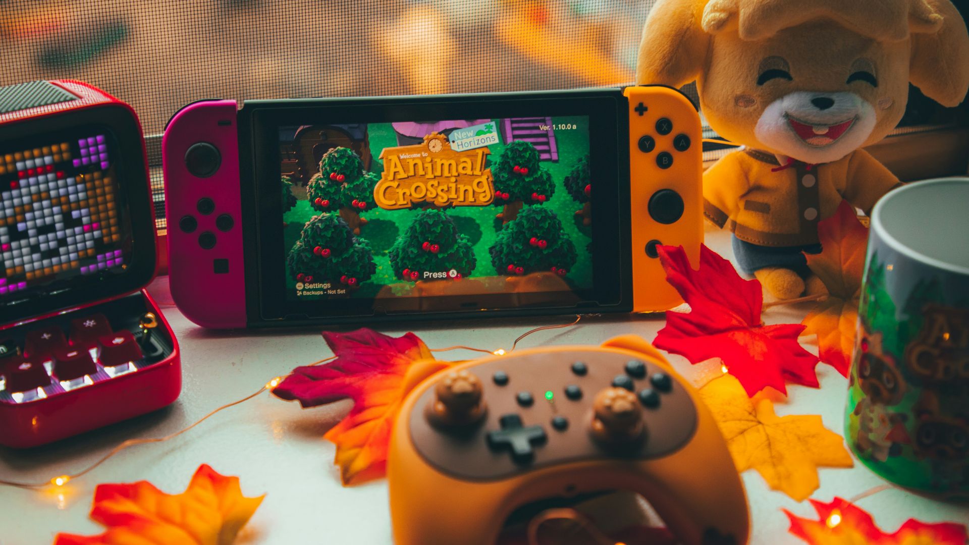 a mobile phone and a box of candy on a table