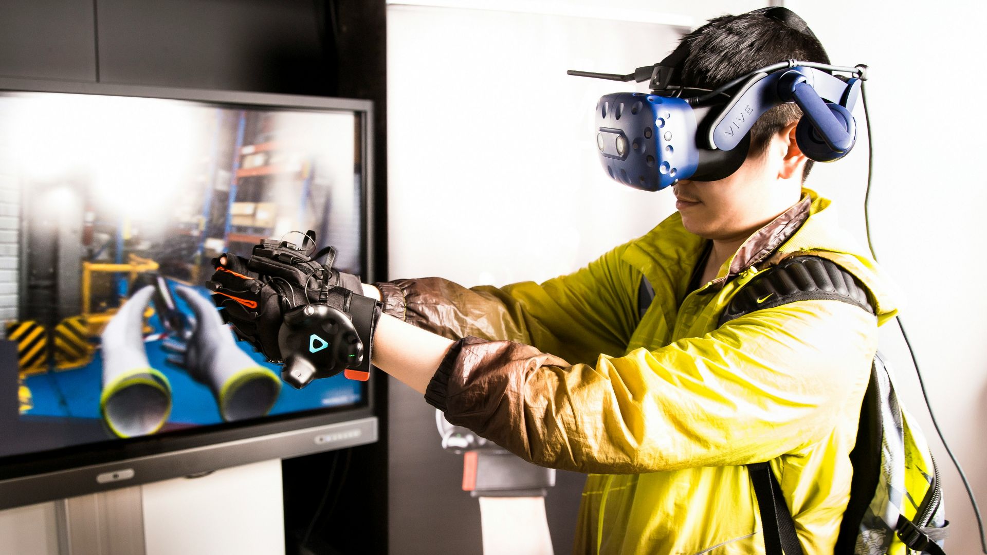 man in yellow jacket wearing black goggles