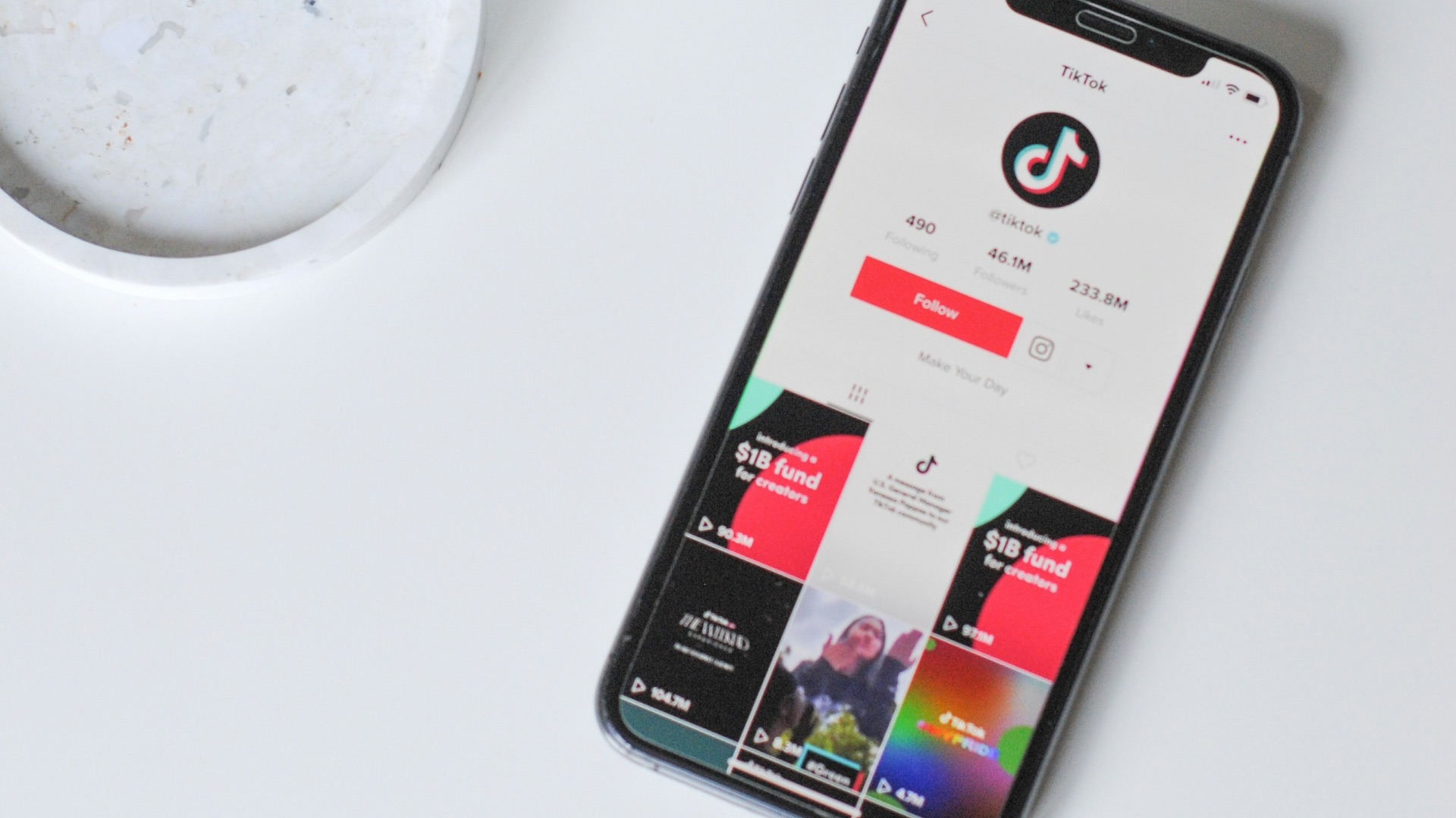 iphone xs on white table