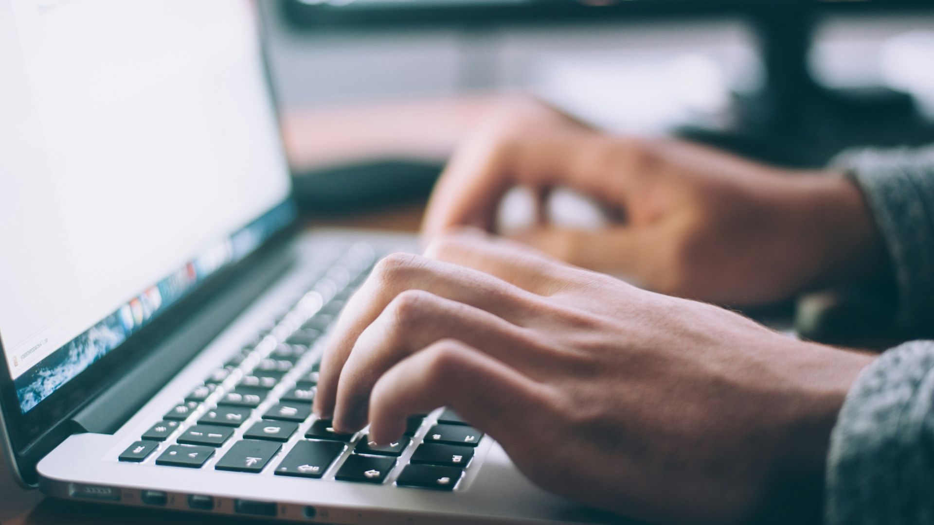 person using MacBook Pro