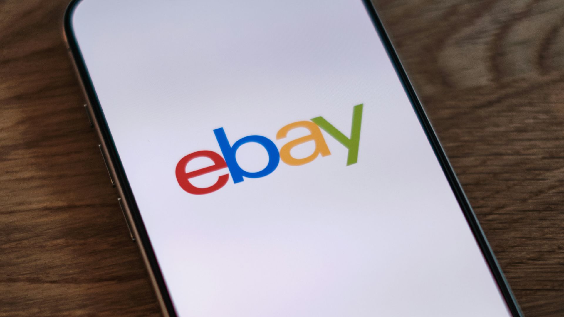 A close up of a cell phone on a table