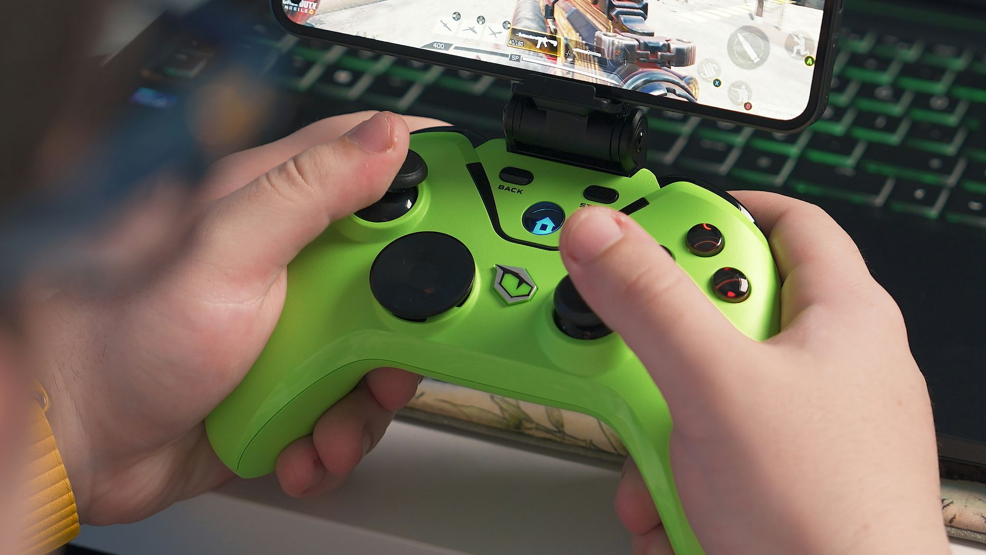 a person playing a video game on a laptop