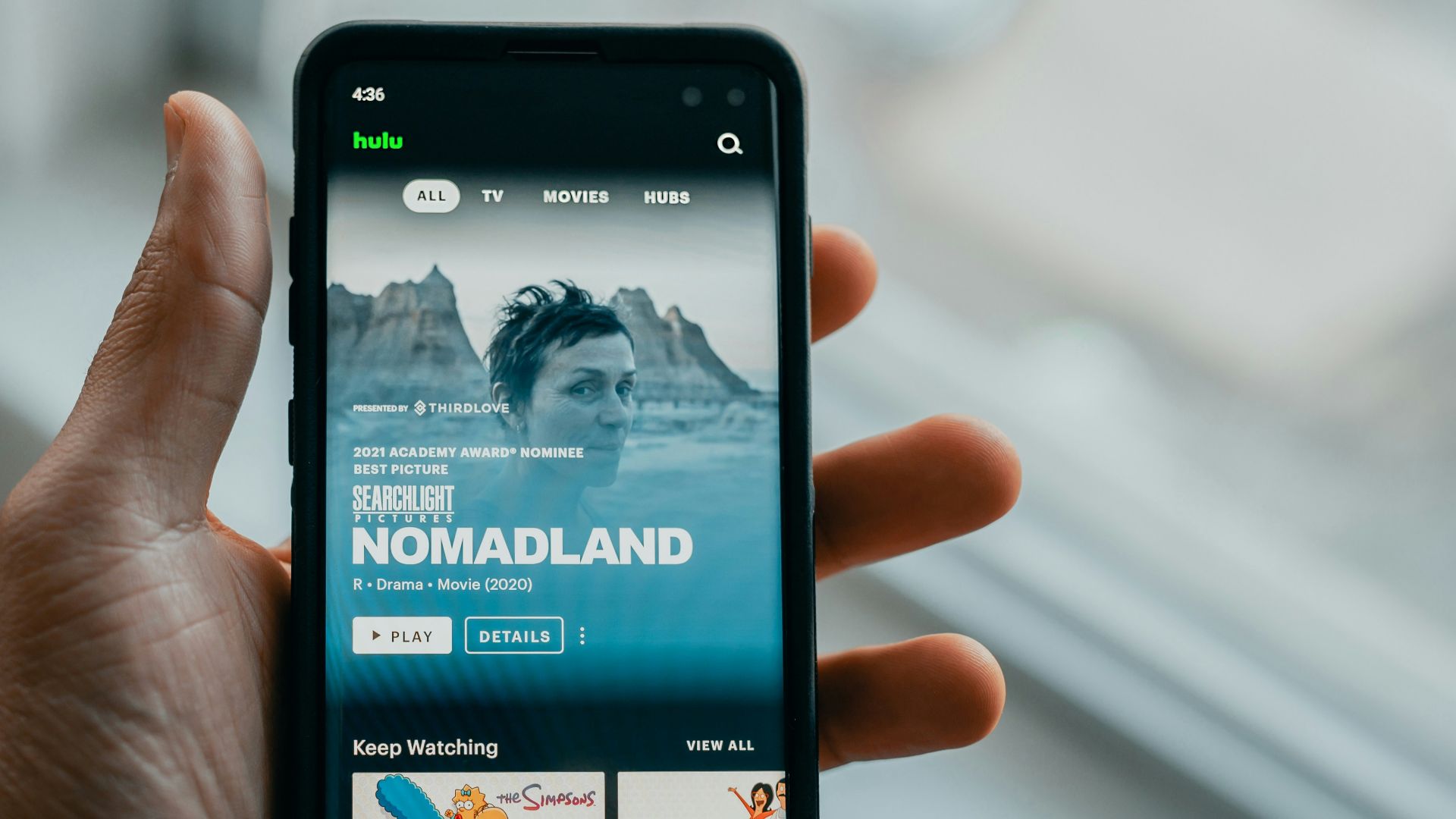 black iphone 5 displaying man in black jacket