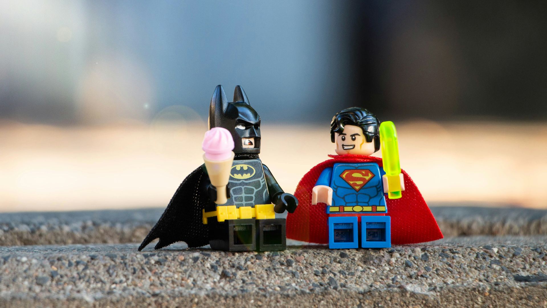 lego mini figure on brown sand