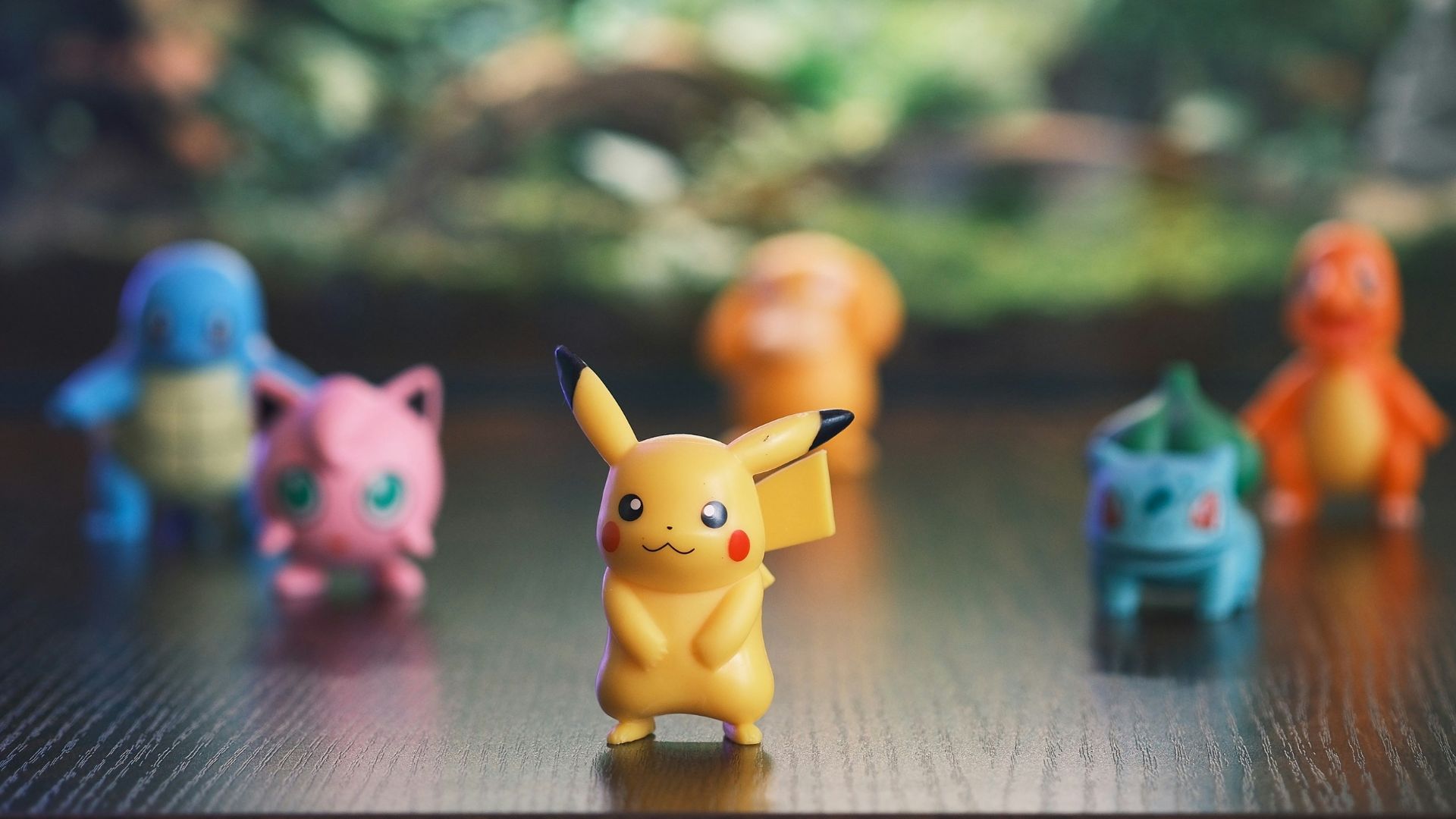 Pikachu and friends in a forest setting