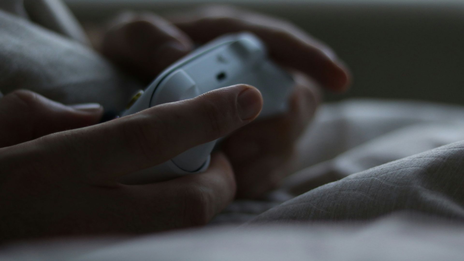 a close up of a person holding a cell phone