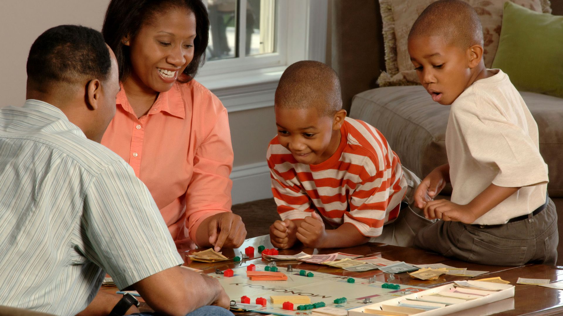 family playing board games