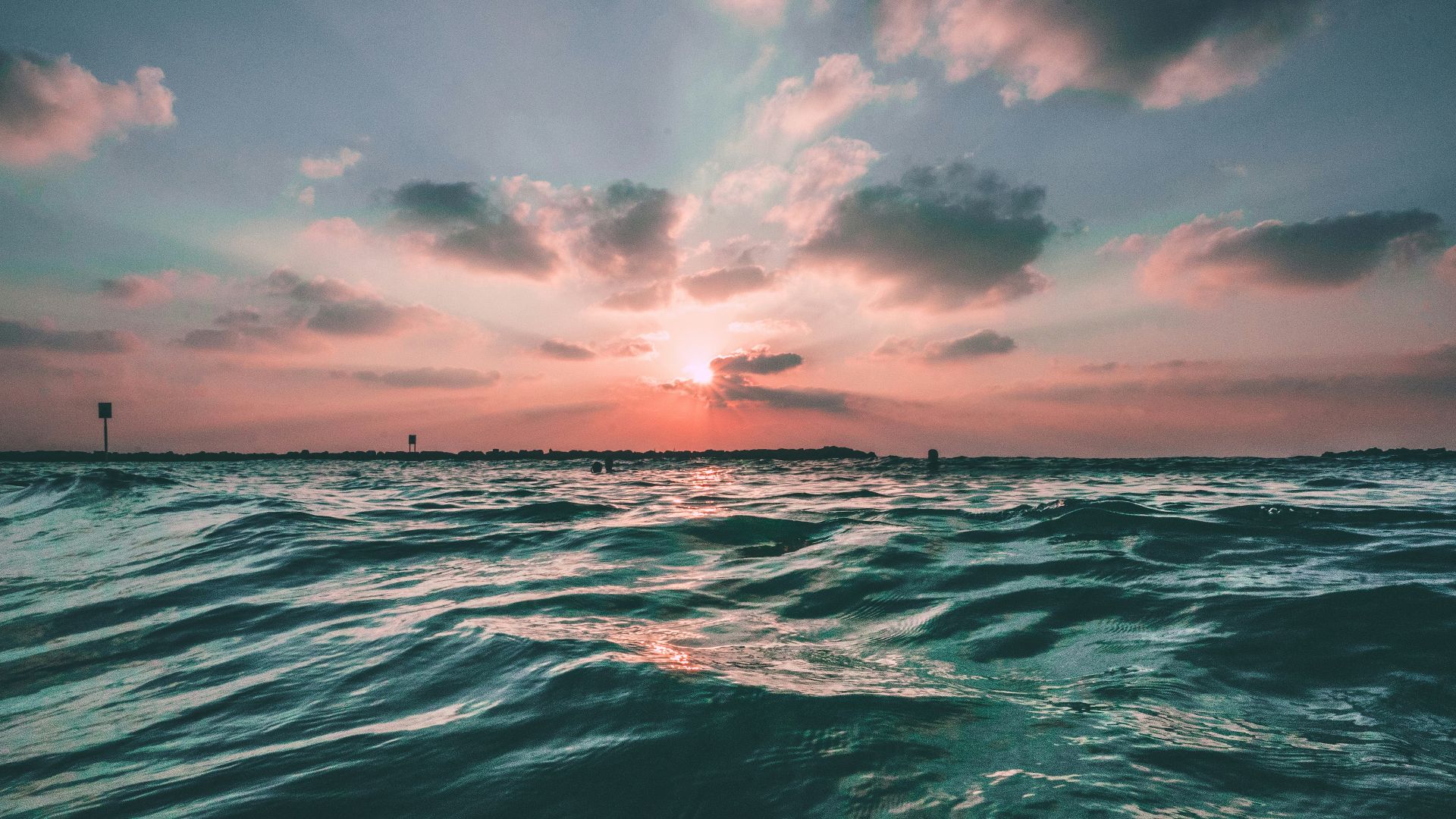 body of water during golden hour