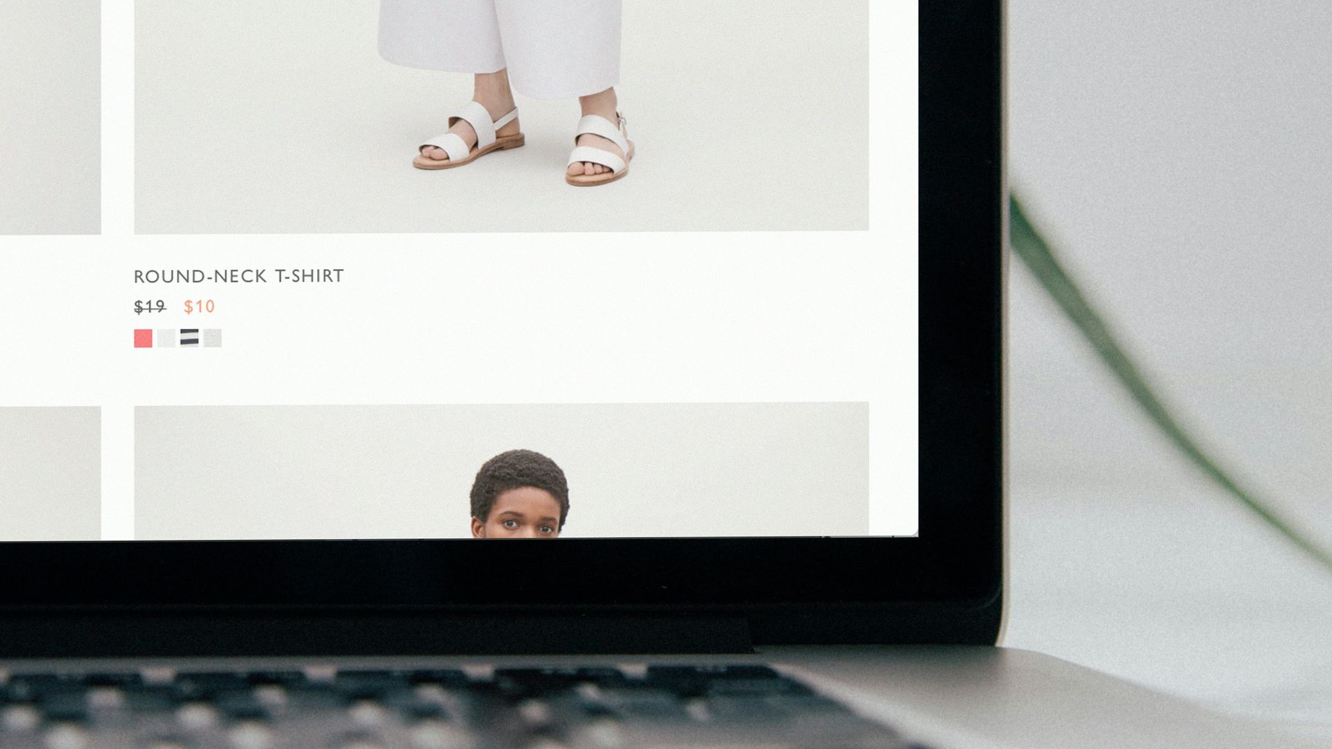 laptop computer displaying Mango pants