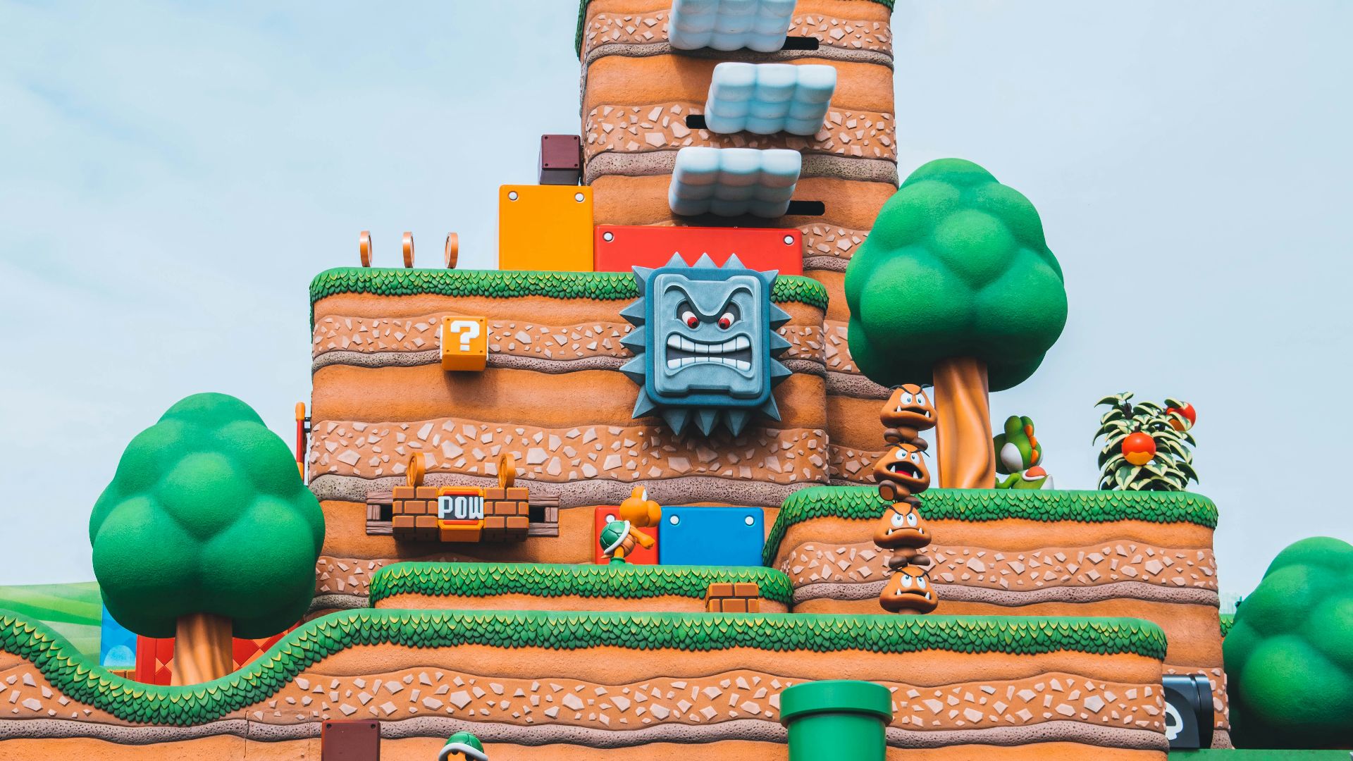 blue green and brown concrete building under blue sky during daytime