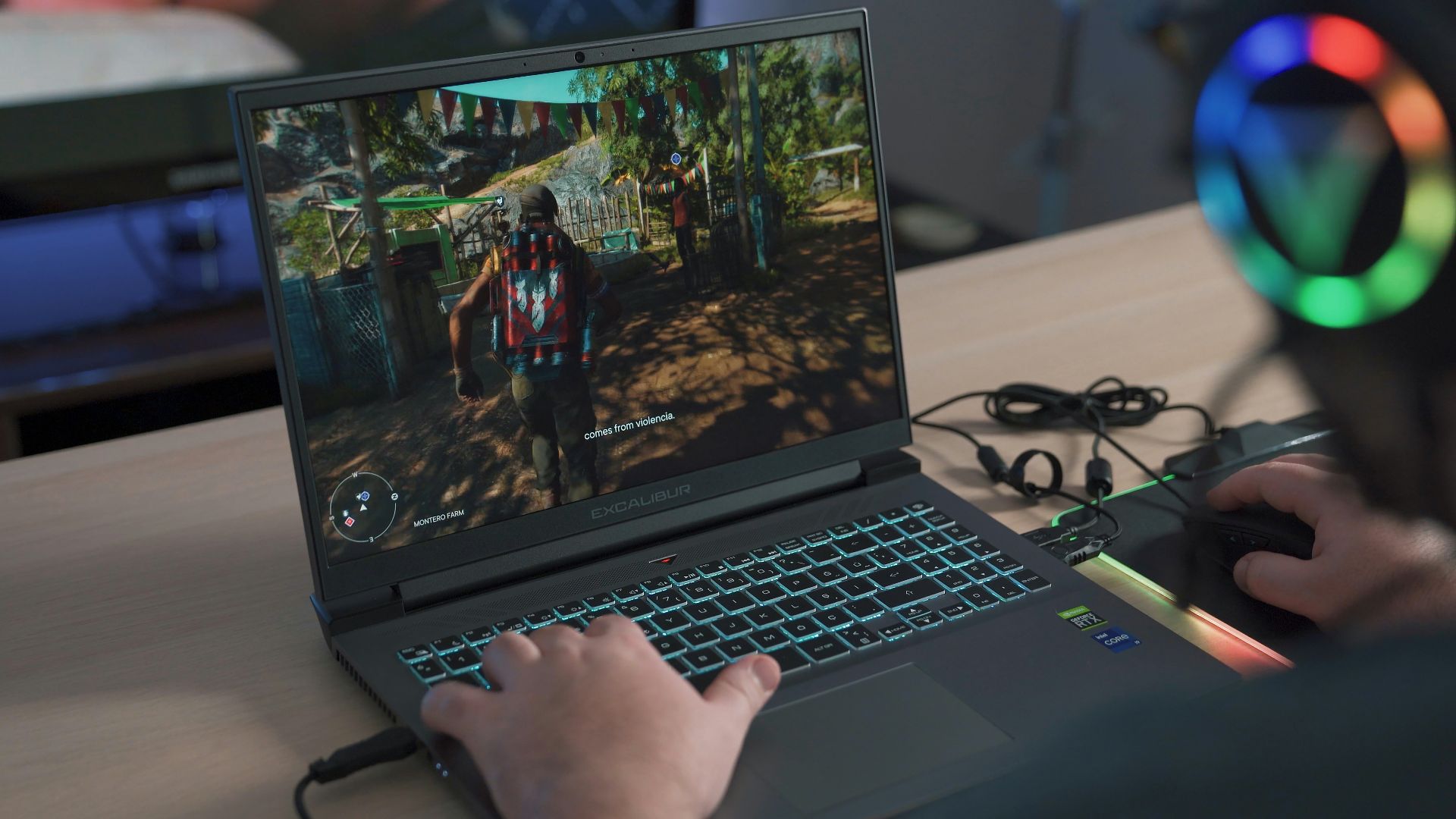 a person playing a video game on a laptop