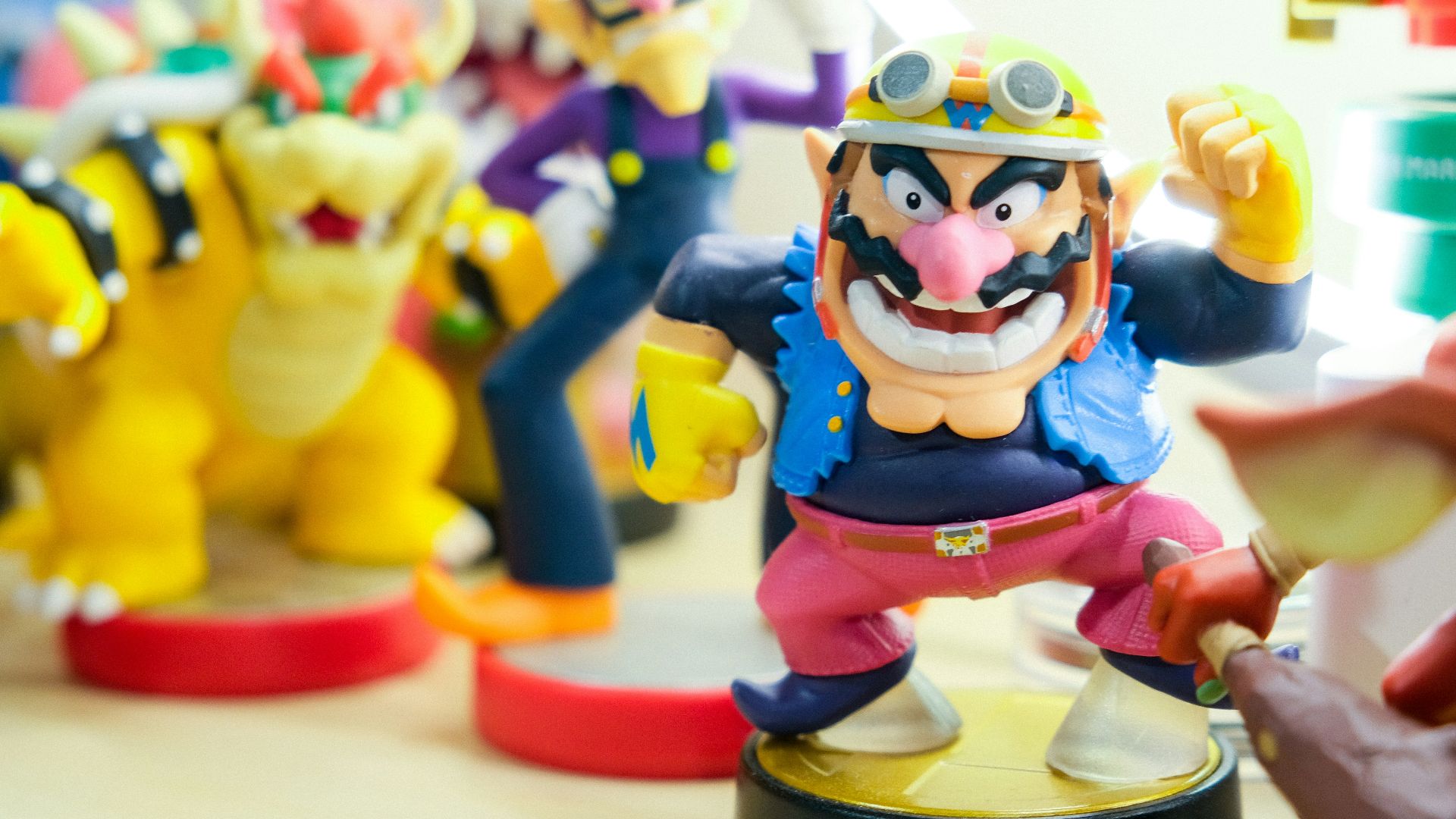 Super Mario vinyl figures on table
