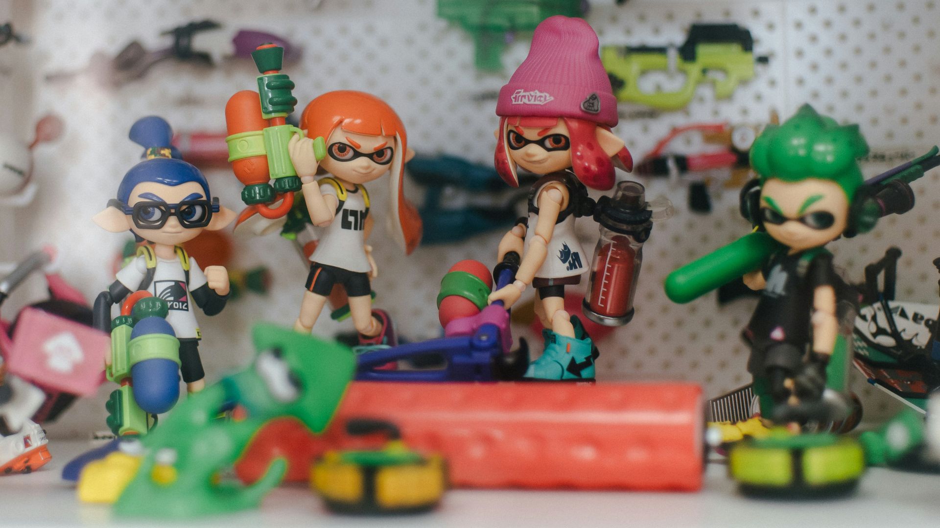 a group of toy figurines sitting on top of a table