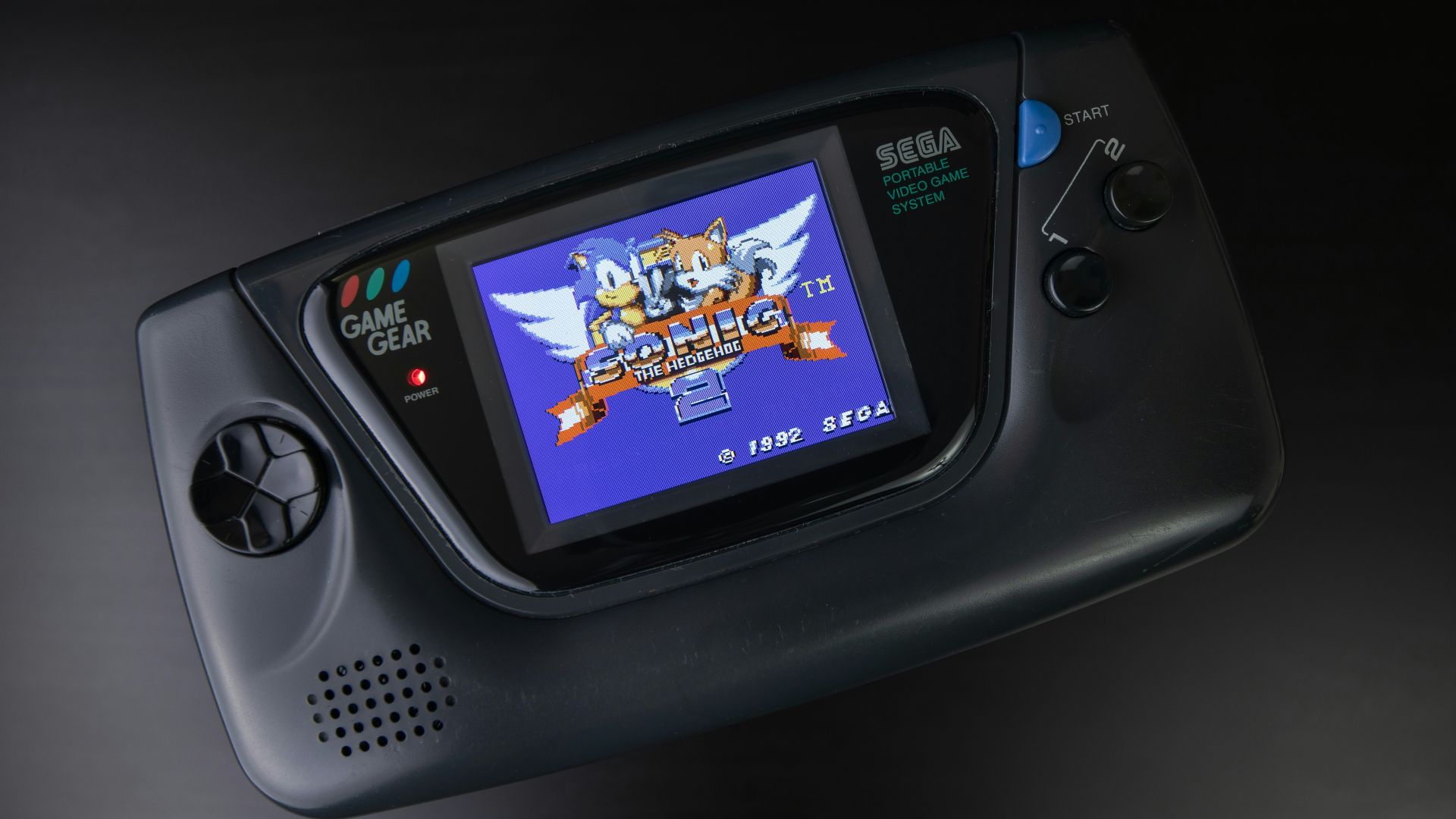 black sony digital device on black surface