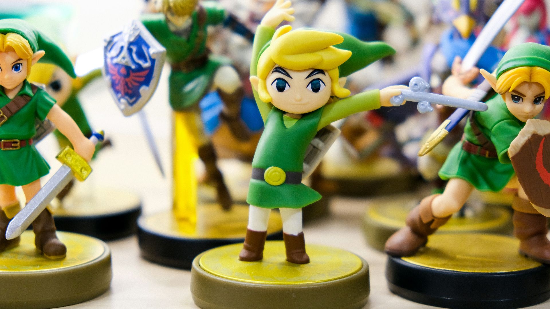 selective focus photography of Link vinyl figures