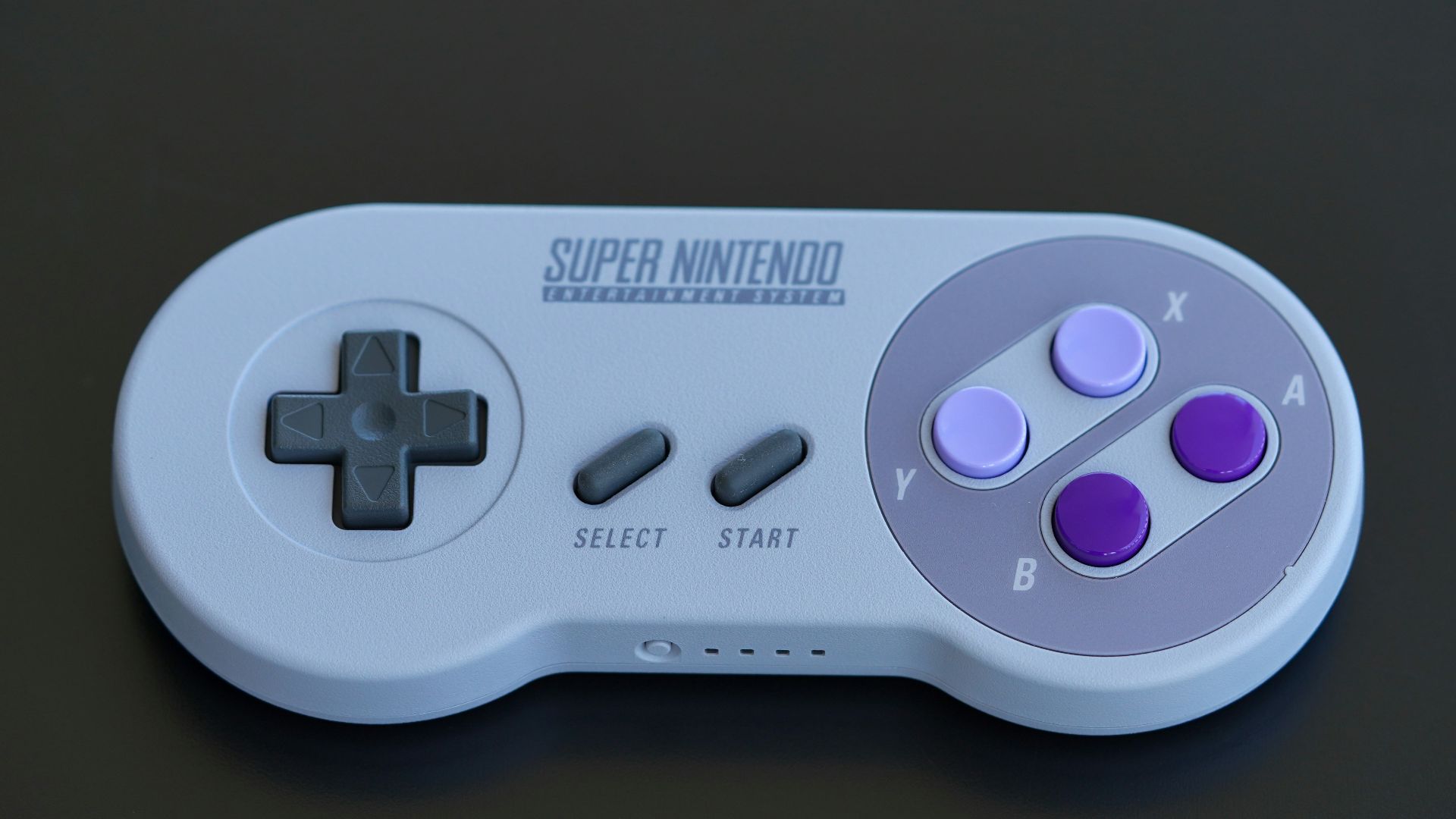 white and black game controller